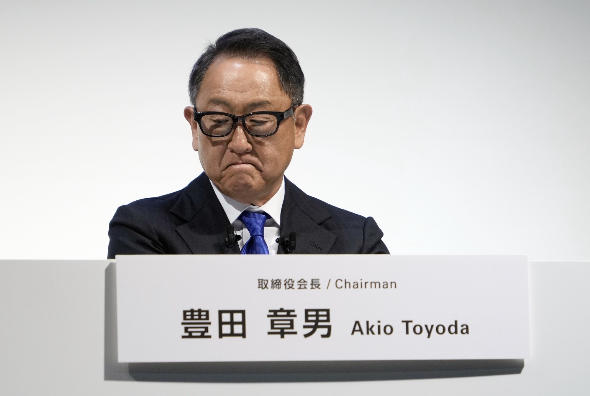 epa11386874 Toyota Motor Corp. Chairman Akio Toyoda reacts during a press conference in Tokyo, Japan, 03 June 2024. Toyota Motor Corp. held a press conference after Japan&#039;s transport ministry said it found authentication fraud in processes conducted on pedestrian protection tests in three current models and tampering with test vehicles in crash tests in four past models at Toyota.  EPA/FRANCK ROBICHON