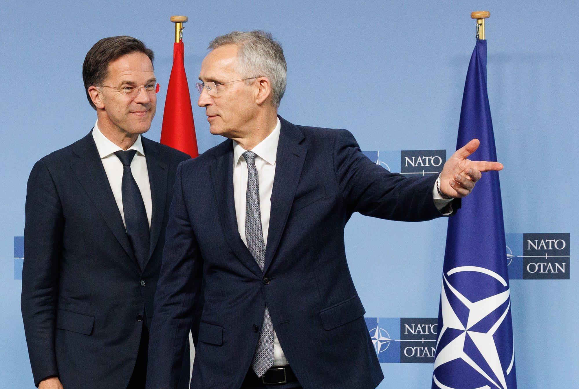 epa11284176 Dutch Prime Minister Mark Rutte (L) and NATO Secretary General Jens Stoltenberg speak at the NATO headquarters in Brussels, Belgium, 17 April 2024.  EPA/OLIVIER MATTHYS