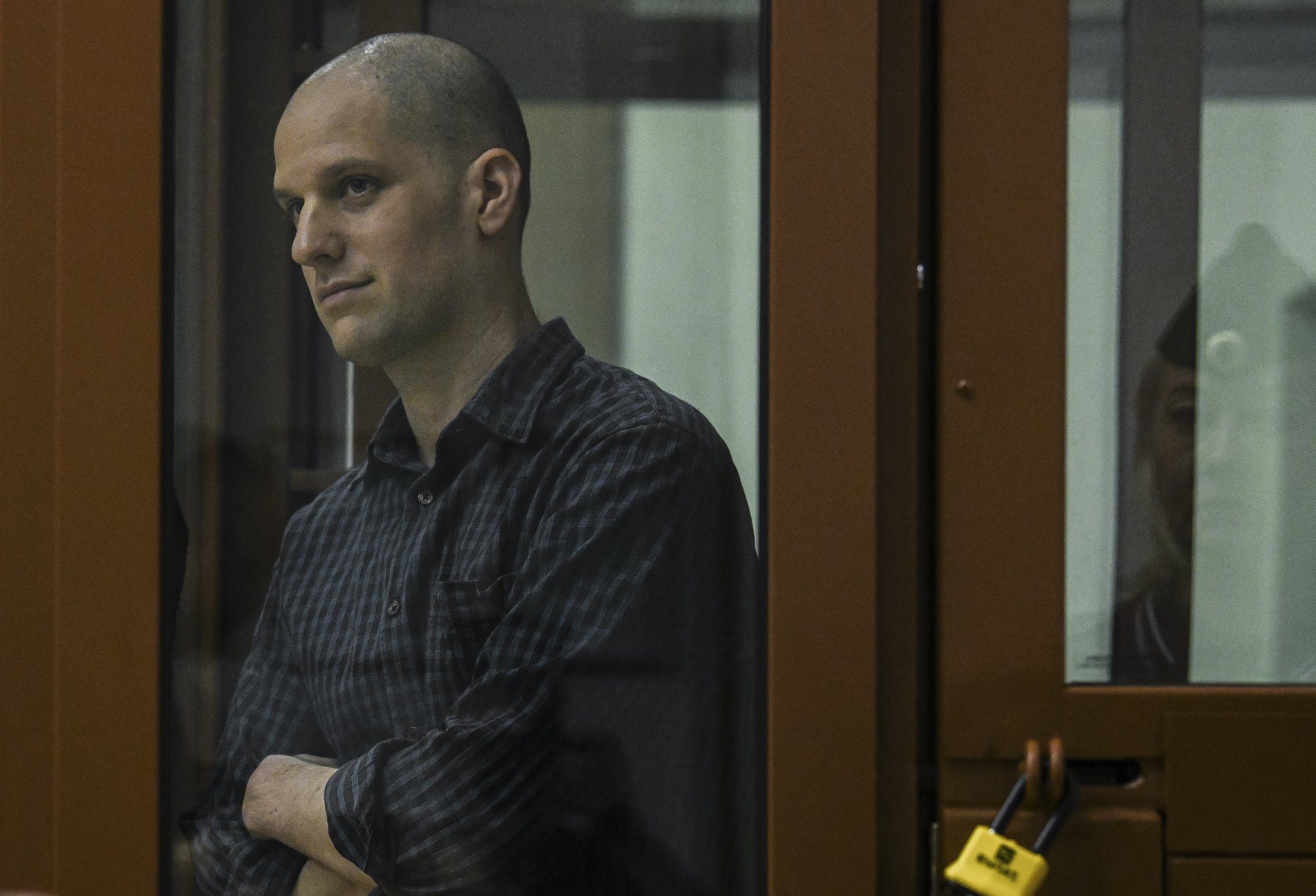 epa11439453 WSJ correspondent Evan Gershkovich stands in a glass cage prior to a hearing in Yekaterinburg&#039;s Sverdlovsk Regional Court, Yekaterinburg, Russia, 26 June 2024. Evan Gershkovich, a US journalist of The Wall Street Journal covering Russia, was detained in Yekaterinburg on 29 March 2023. The Russia&#039;s Federal Security Service (FSB) claimed that on the instructions of the American authorities, the journalist collected information constituting a state secret about one of the enterprises of the Russian military-industrial complex. He is charged with espionage under Art. 276 of the Criminal Code of the Russian Federation, which could carry a sentence of up to 20 years.  EPA/STRINGER
