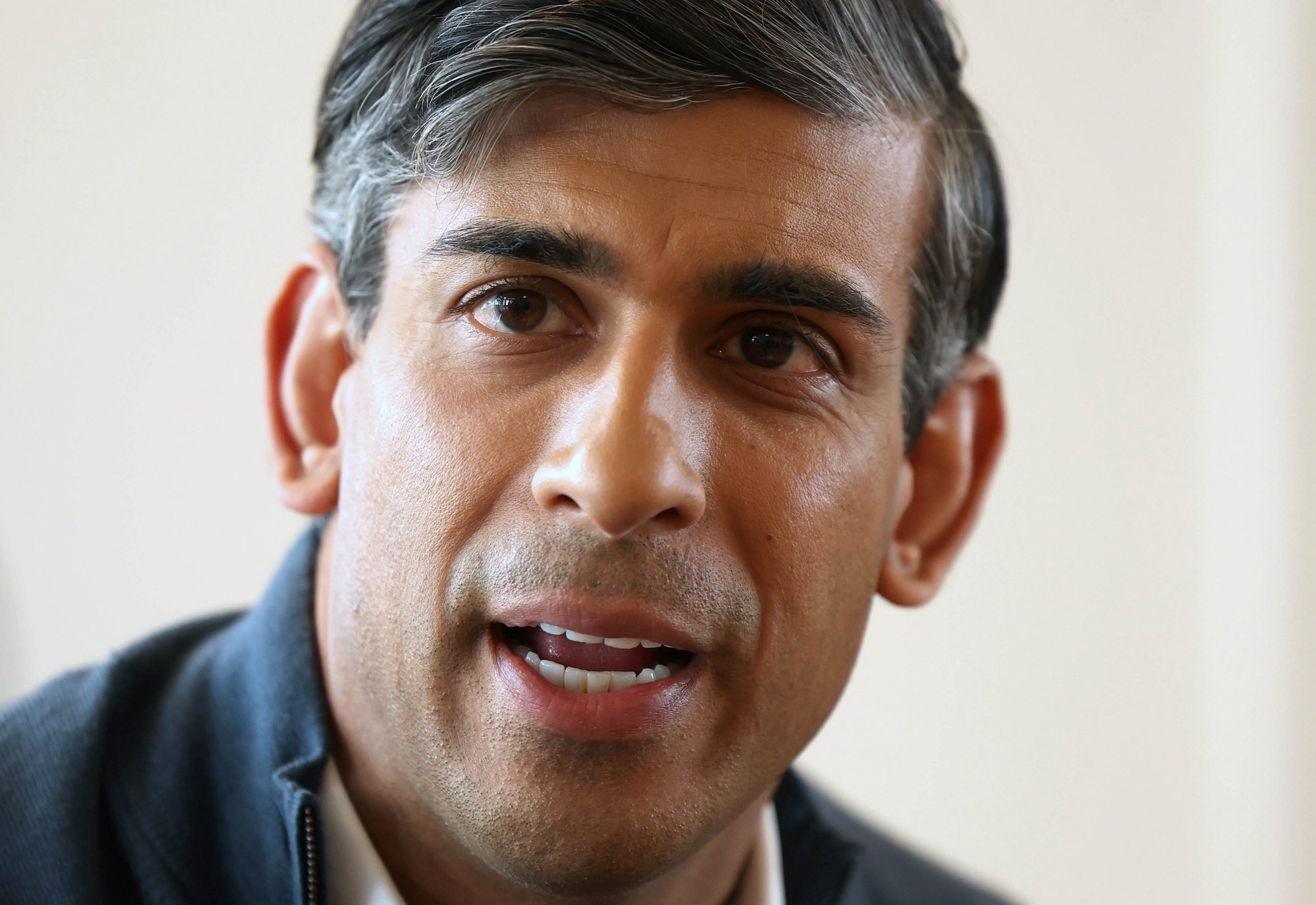 epa11396246 Britain’s Prime Minister Rishi Sunak speaks at a media huddle during a Conservative Party campaign event in Melksham Town Football Club in Wiltshire, Britain, 07 June 2024.  EPA/NEIL HALL