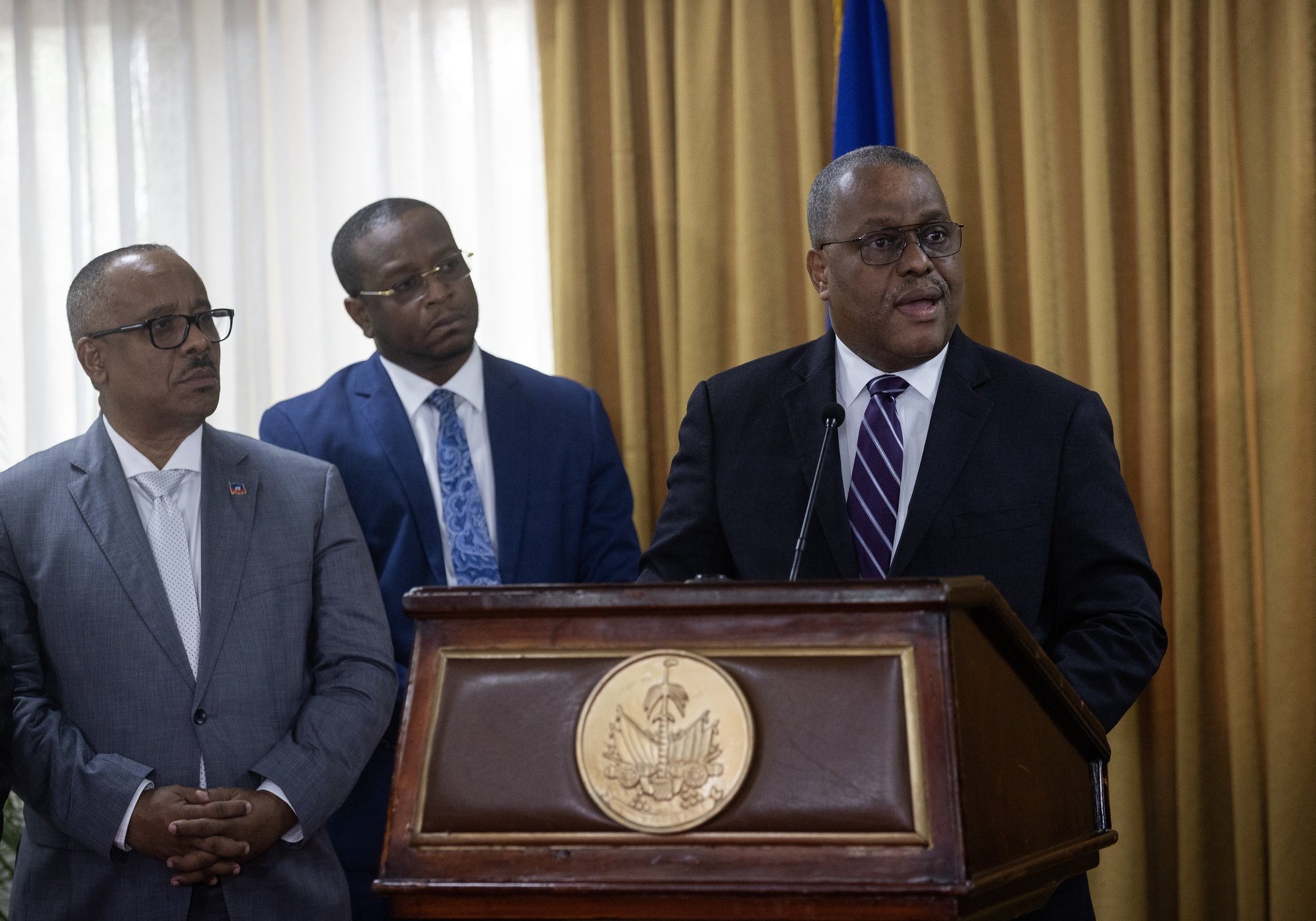 epa11388226 Haitian Prime Minister-designate Garry Conille speaks before the members of the Presidential council of transition during the official presentation of the extension of the decree of his designation in Port-Au-Prince, Haiti, 03 June 2024. Conille arrived in the country on 01 June from abroad to assume office in a nation plunged into an unprecedented socio-political crisis. Haiti is waiting for the arrival of the Multinational Mission to support the security, led by Kenia and with the support of the UN, with the finality to stop the violence in the caribbean country.  EPA/ORLANDO BARRIA