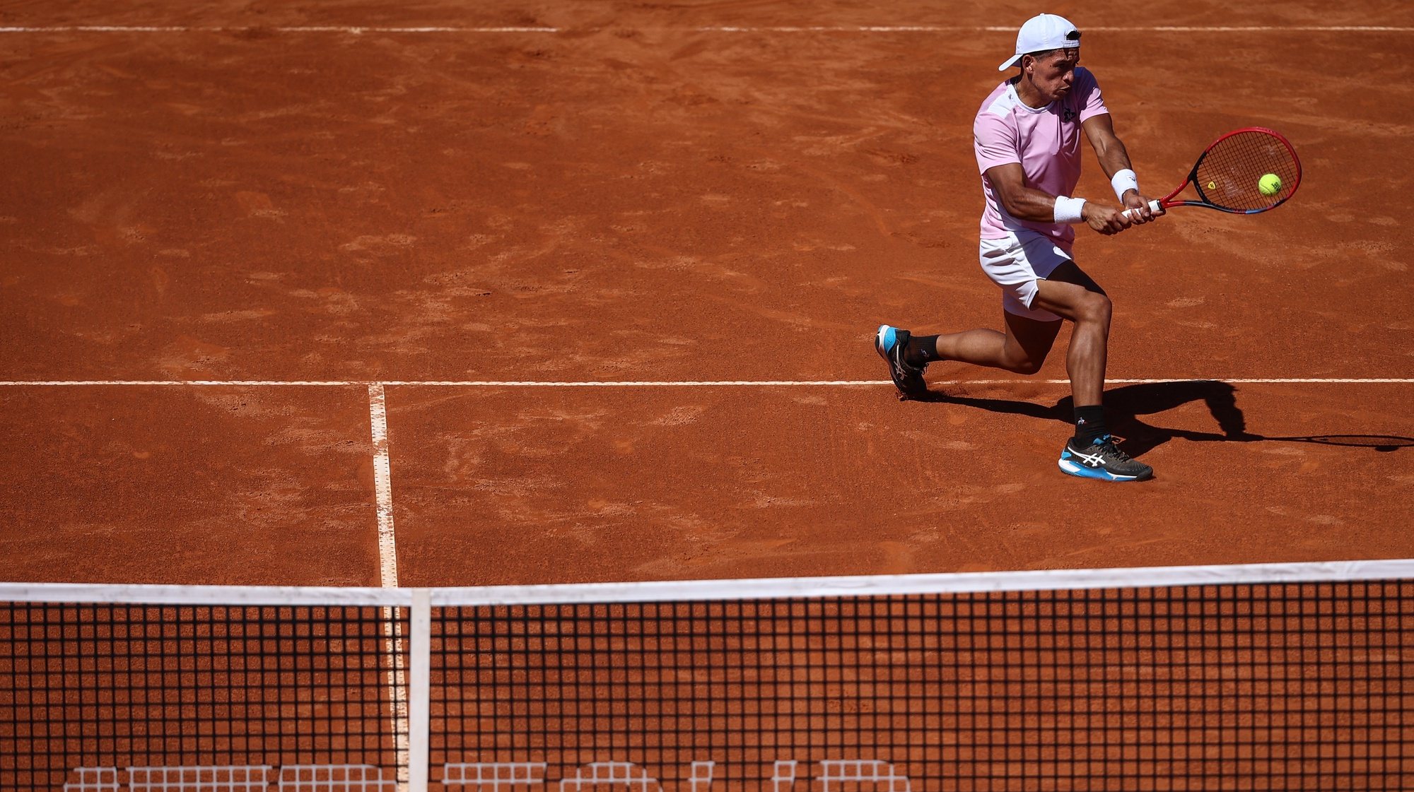 Sebastian Baez from Argentine in action against Pedro Cachin from Argentine in the Round of 32 match at the Estoril Open tennis tournament in Estoril, Portugal, 05 April 2023. RODRIGO ANTUNES/LUSA