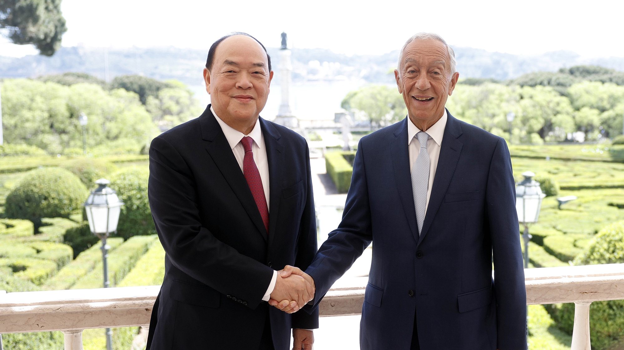 The President of the Republic, Marcelo Rebelo de Sousa (R), greets the Chief Executive of the Macau Special Administrative Region (MSAR), Ho Iat Seng (L), before an audience at the Belem Palace in Lisbon, Portugal, 20th April 2023. ANTONIO PEDRO SANTOS/LUSA
