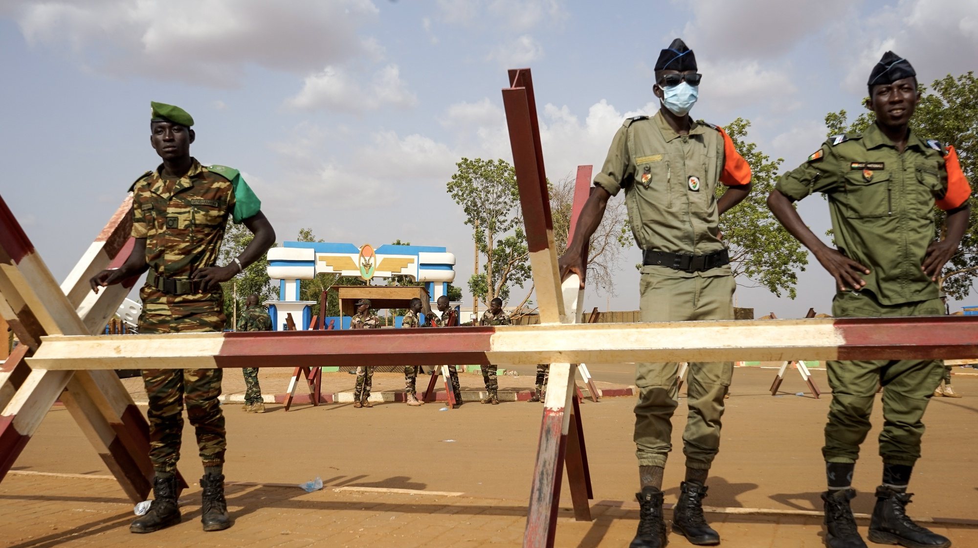 epa10865329 Gendarmes stand guard near the entrance to the French military base during a rally against the French military in Niamey, Niger, 16 September 2023. French President Emmanuel Macron said while addressing reporters on 15 September that the French ambassador to Niger, Sylvain Itte was &#039;literally being held hostage in the French Embassy&#039; in Niger and living off &#039;military rations&#039;.  EPA/ISSIFOU DJIBO