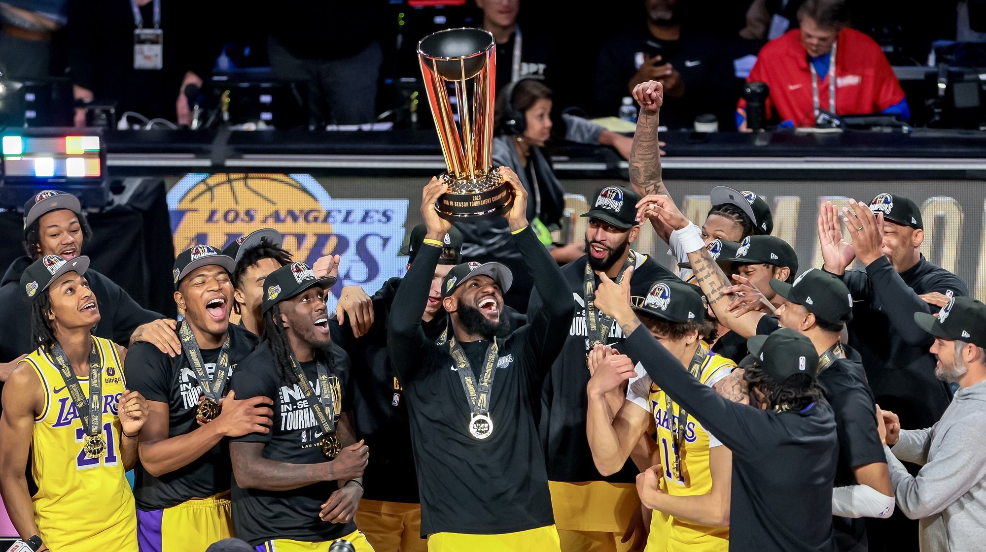 epa11020664 Los Angeles Lakers forward LeBron James raises the NBA Cup trophy after defeating the Indiana Pacers in the NBA In-Season Tournament championship final at T-Mobile Arena in Las Vegas, Nevada, USA, 09 December 2023.  EPA/ALLISON DINNER SHUTTERSTOCK OUT