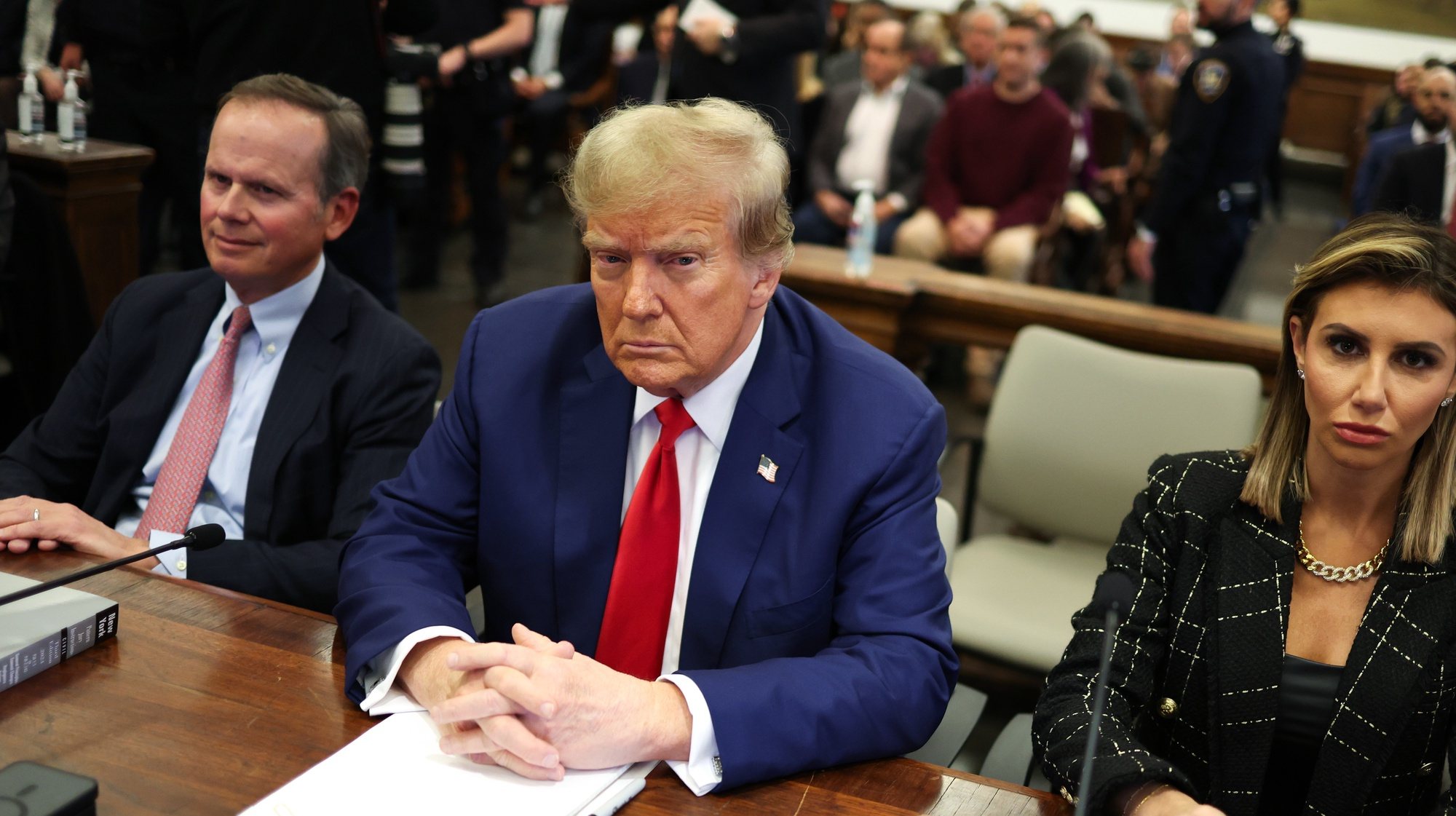 epa11069856 Former US President Donald J. Trump (C), flanked by lawyers Christopher Kise (L) and Alina Habba (R), sits in court during closing arguments in the Trump Organization civil fraud trial at New York State Supreme Court in the Manhattan borough of New York, New York, USA, 11 January 2024. Trump is facing up to a 370 million US dollar fine for inflating the value of assets to get favorable loans from banks.  EPA/CHARLY TRIBALLEAU / POOL