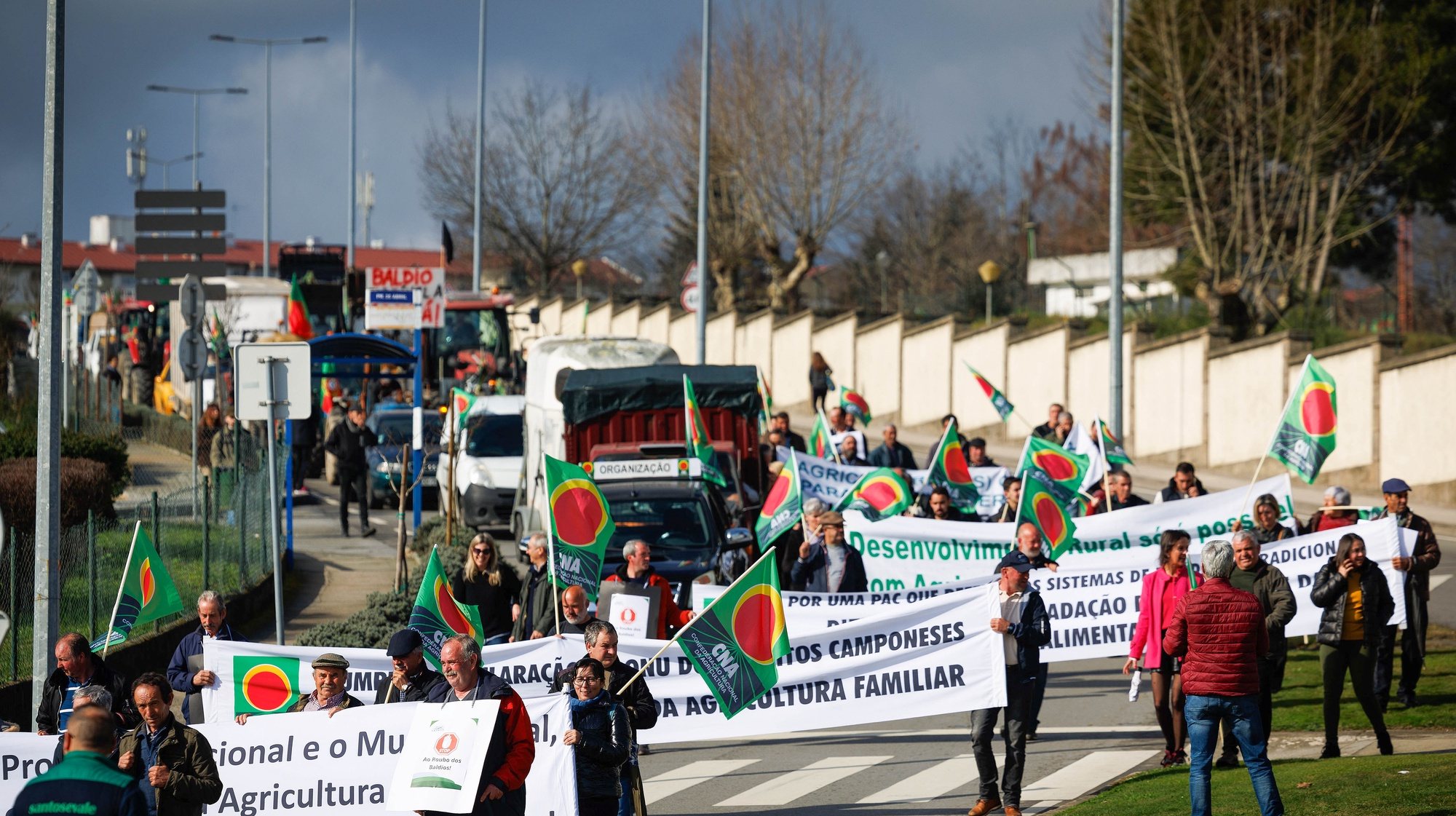 Farmers take part in a slow march promoted by the National Confederation of Agriculture (CNA), fighting for fair prices for production, in Vila Real, 07 February  2024. Farmers are uniting to demand better incomes and fair prices for production and to defend national production, family farming and the wasteland, and, at the end, they will vote on a list of complaints to hand into the sovereign bodies and political parties. PEDRO SARMENTO COSTA/LUSA
