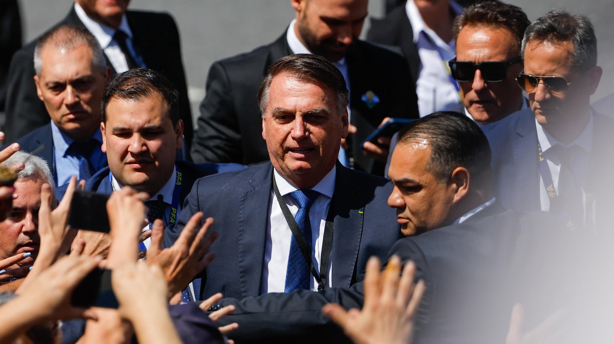 epa11021294 Former Brazilian President Jair Bolsonaro (C) arrives at the Argentine National Congress to attend the ceremony in which president-elect Javier Milei will be sworn in as president of Argentina in Buenos Aires, Argentina, 10 December 2023. The far-right libertarian economist Milei will be sworn in at the National Congress to become president of the South American country for the period 2023-2027 after winning the runoff election on 19 November.  EPA/Juan Ignacio Roncoroni