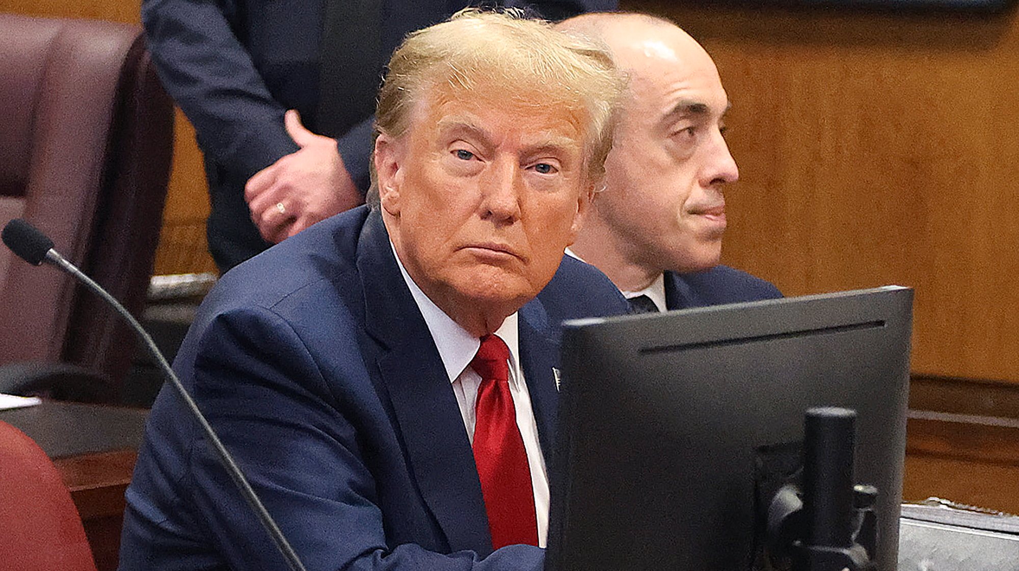 epa11155190 Former U.S. President Donald Trump (L) awaits the start of a hearing at the New York City Criminal Court in New York City, USA, 15 February 2024. Trump is facing 34 felony counts of falsifying business records related to payments made to adult film star Stormy Daniels during his 2016 presidential campaign. A New York judge says former President Donald Trump&#039;s hush-money trial will go ahead as scheduled with jury selection starting on March 25.  EPA/JEFFERSON SIEGEL / POOL