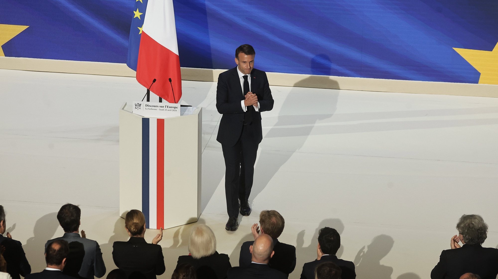 epa11299710 French President Emmanuel Macron at the end of his speech on Europe in the amphitheater of the Sorbonne University in Paris, France, 25 April 2024. Macron spoke about the future of the European Union nearly seven years after his previous speech and ahead of the European elections on 09 June.  EPA/CHRISTOPHE PETIT TESSON / POOL