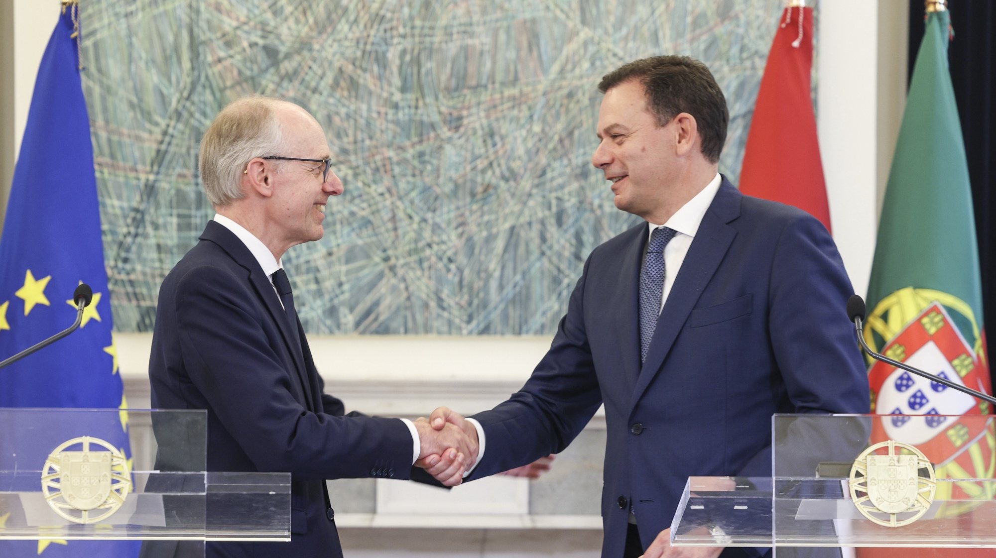 Prime Minister of Portugal Luis Montenegro (R) greets his Luxembourg counterpart Luc Frieden (L) during a press conference after their meeting at Sao Bento Palace in Lisbon, Portugal, 31 May 2024. MIGUEL A. LOPES/LUSA
