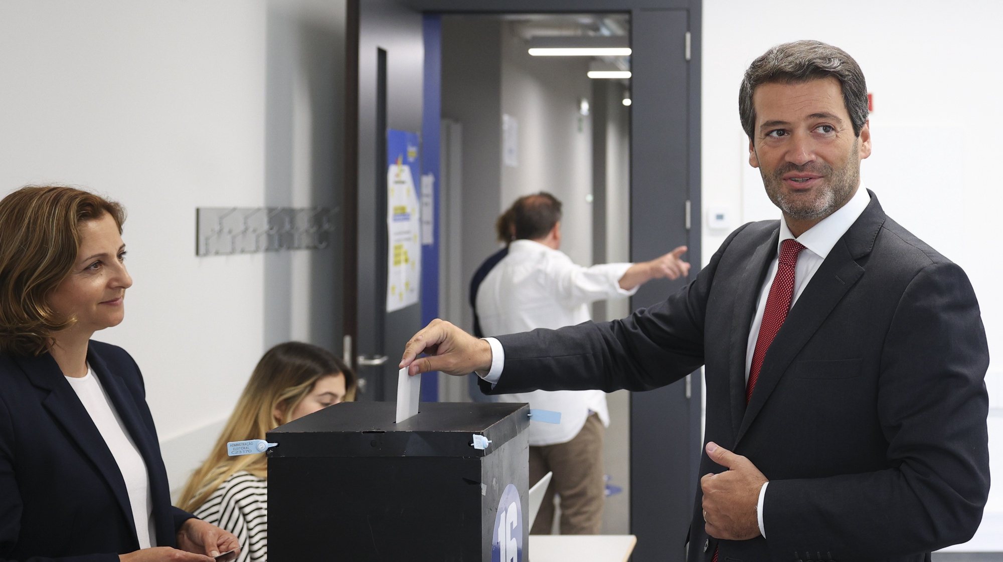 Chega (CH) President Andre Ventura (R) cast his ballot for the European Elections at a polling station in Lisbon, Portugal, 09 June 2024. More than 10.8 million registered voters in Portugal and abroad go to the polls today to choose 21 of the 720 members of the European Parliament. ANTONIO COTRIM/LUSA