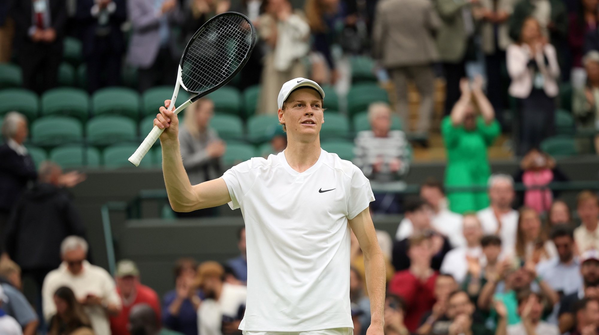 epa11465553 Jannik Sinner of Italy greets the crowd after winning against Ben Shelton of the US (unseen) during their round of 16 match at the Wimbledon Championships, Wimbledon, Britain, 07 July 2024.  EPA/TIM IRELAND  EDITORIAL USE ONLY