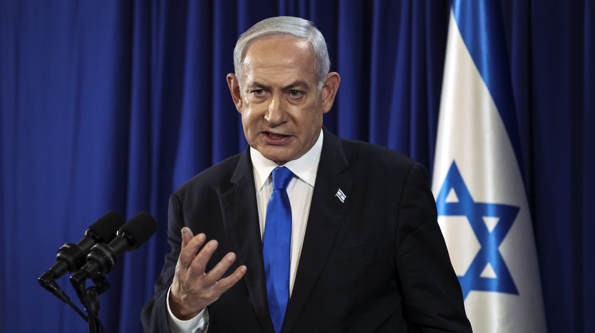 epa11476607 Israeli Prime Minister Benjamin Netanyahu speaks during a press conference amid the ongoing conflict in Gaza between Israel and Hamas, in Tel Aviv, Israel, 13 July 2024.  EPA/NIR ELIAS / POOL