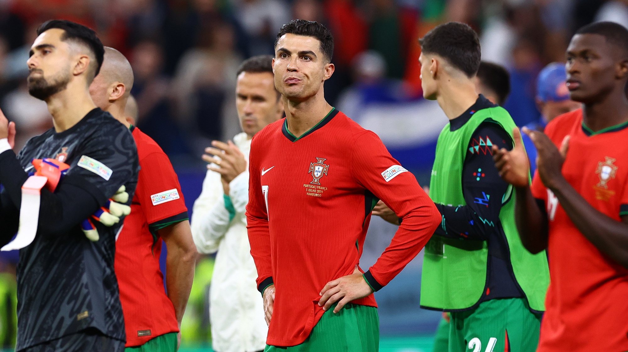 epa11461180 Cristiano Ronaldo of Portugal looks on after losing the penalty shootout of the UEFA EURO 2024 quarter-finals soccer match between France and Portugal, in Hamburg, Germany, 05 July 2024.  EPA/FILIP SINGER