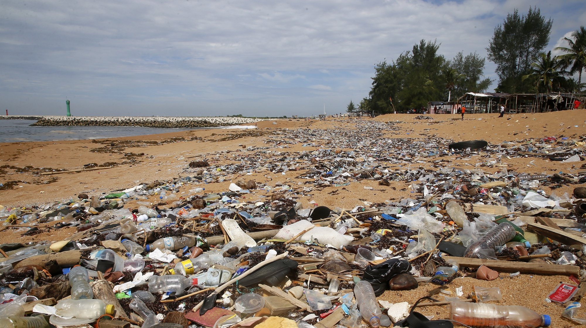 epa09995806 A general view of plastic debris on Vridi beach, a popular tourist destination in the city of Abidjan, Ivory Coast, 04 June 2022, a day before World Environment Day. In 1972, the United Nations General Assembly designated 05 June as World Environment Day (WED). The first celebration, under the slogan &#039;One Planet Earth&#039;, took place in 1974. Over the years, the World Environment Day has become a global platform facilitating awareness and initiative to respond to urgent challenges, whether it&#039;s marine pollution, global warming, sustainable consumption or wildlife crime. Millions of people have taken part over the years and have helped change our consumption habits, as well as national and international environmental policies.  EPA/LEGNAN KOULA