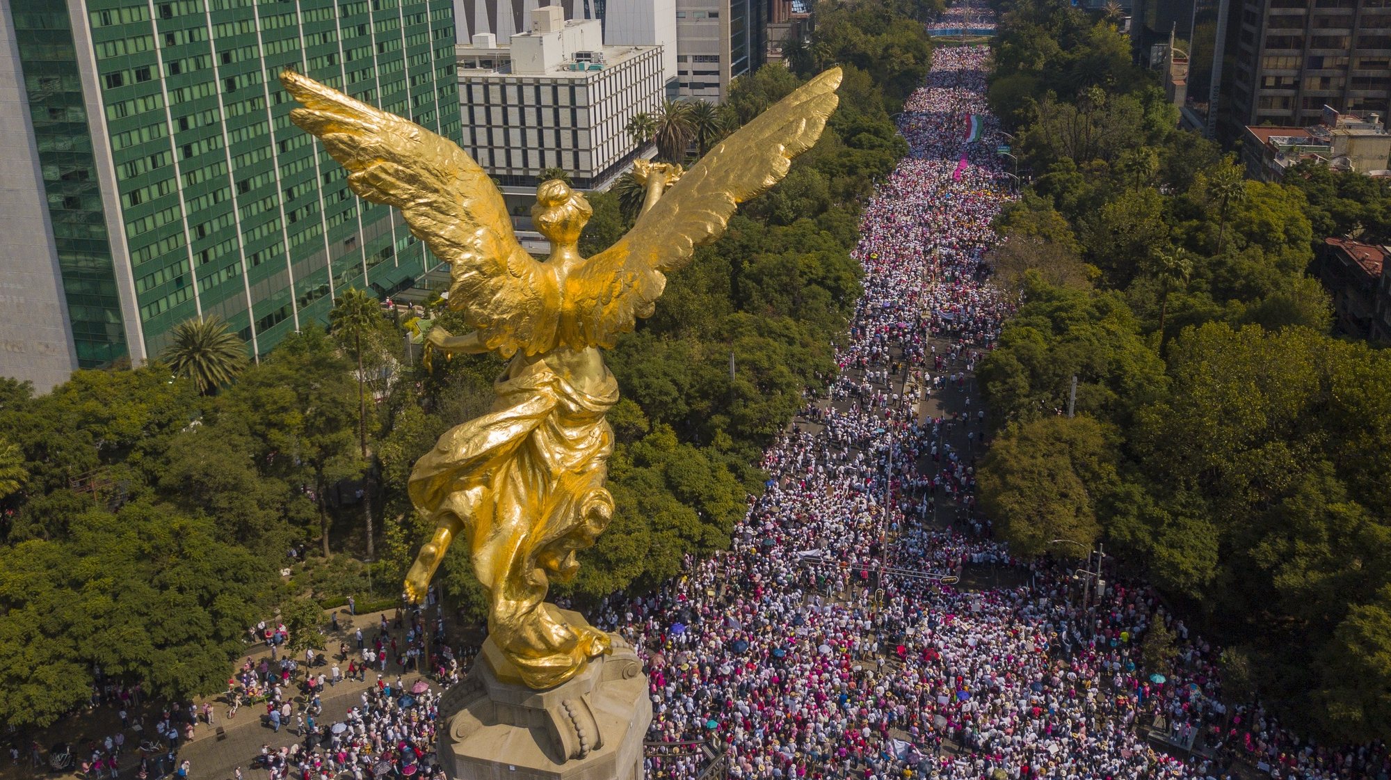 epa10304460 Photograph taken from a drone showing thousands of people marching along the renowned Paseo de la Reforma avenue, in Mexico City, Mexico, 13 November 2022. Thousands of people, mostly opponents, marched this Sunday through the streets of Mexico City and other cities in the country in defense of the National Electoral Institute (INE) and against the controversial electoral reform promoted by the country&#039;s president, Andres Manuel Lopez Obrador.  EPA/ISAAC ESQUIVEL