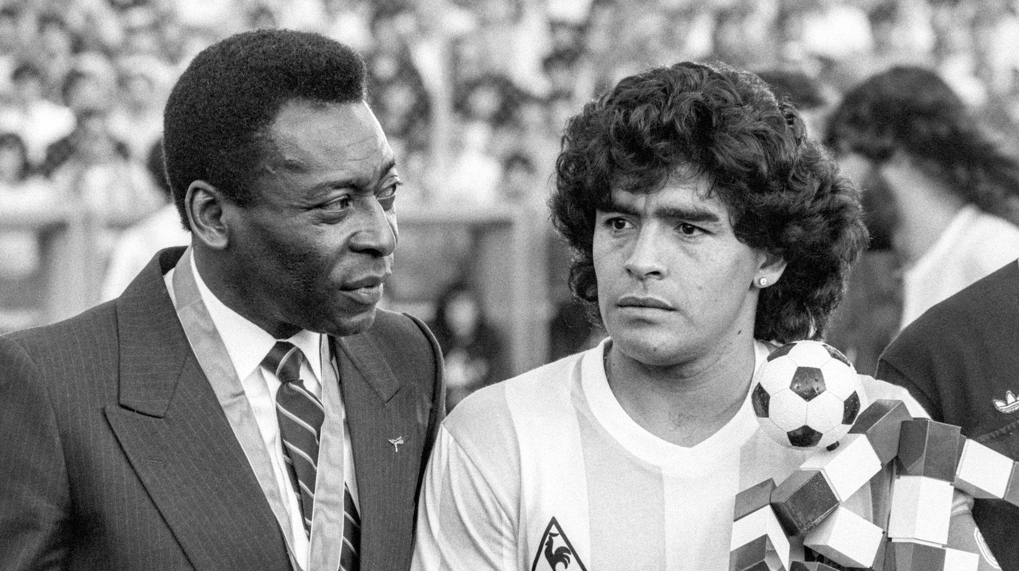 epa08841682 (FILE) - Brazilian soccer legend Pele (L) and Argentinian soccer legend Diego Maradona (R) during the match between Italy and Argentina in Zurich, Switzerland, 10 June 1987 (re-issued on 25 November 2020). Diego Maradona has died after a heart attack, media reports claimed on 25 November 2020. The Argentine soccer great was among the best players ever and who led his country to the 1986 World Cup title before later struggling with cocaine use and obesity. He was 60.  EPA/STR B/W ONLY