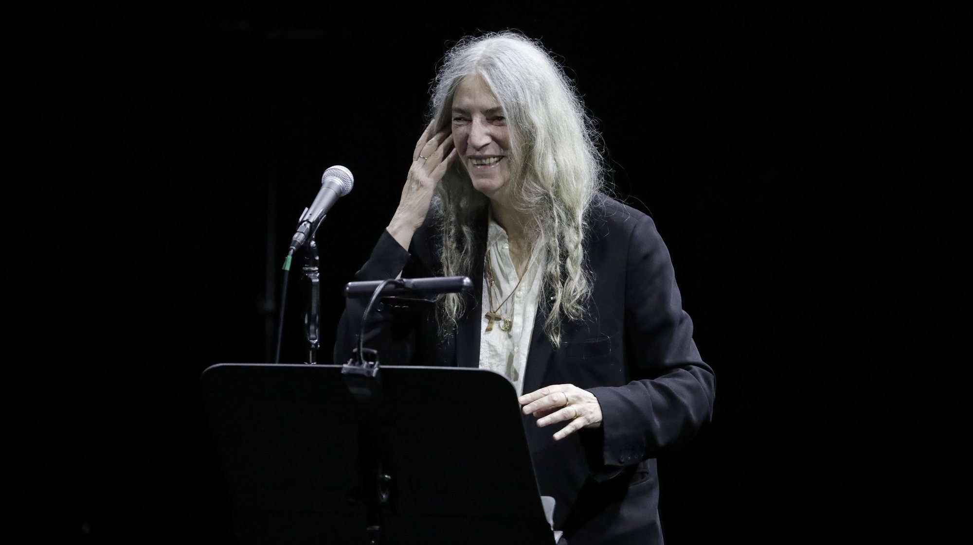 epa10768690 US artist Patti Smith performs in concert along with Soundwalk Collective, at the Teatro Colon in Bogota, Colombia, 25 July 2023.  EPA/Carlos Ortega