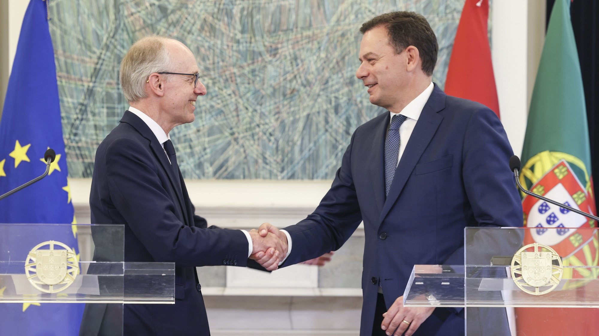 Prime Minister of Portugal Luis Montenegro (R) greets his Luxembourg counterpart Luc Frieden (L) during a press conference after their meeting at Sao Bento Palace in Lisbon, Portugal, 31 May 2024. MIGUEL A. LOPES/LUSA