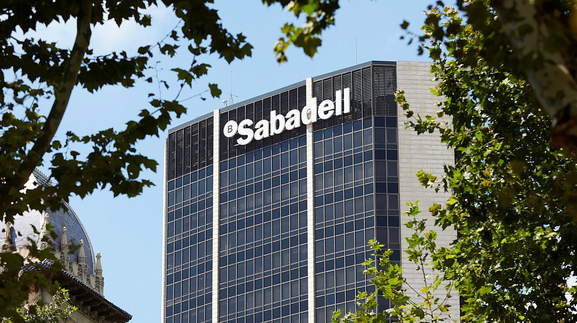 epa08824062 (FILE) View of the Sabadell bank headquarters in Barcelona, Spain, 28 July 2017 (reissued 16 November 2020). Spanish leading banks BBVA and Banco Sabadell are currently on negotiations of a possible merge of both entities to gather a capital mounting to 950 million euro and could become Spain&#039;s main banking entity.  EPA/ALEJANDRO GARCÃA