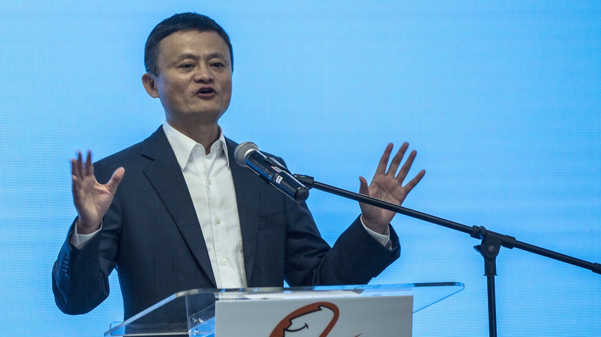 epa08902046 (FILE) - Jack Ma, the founder and executive chairman of Chinese e-commerce company Alibaba Group delivers his speech during the opening of the Alibaba group office in Kuala Lumpur, Malaysia, 18 June 2018 (reissued 24 December 2020). According to media reports on 24 December 2020, China&#039;s State Administration for Market Regulation initiated a probe into the business practices of e-commerce company Alibaba, due to allegations of monopolistic acts.  EPA/AHMAD YUSNI