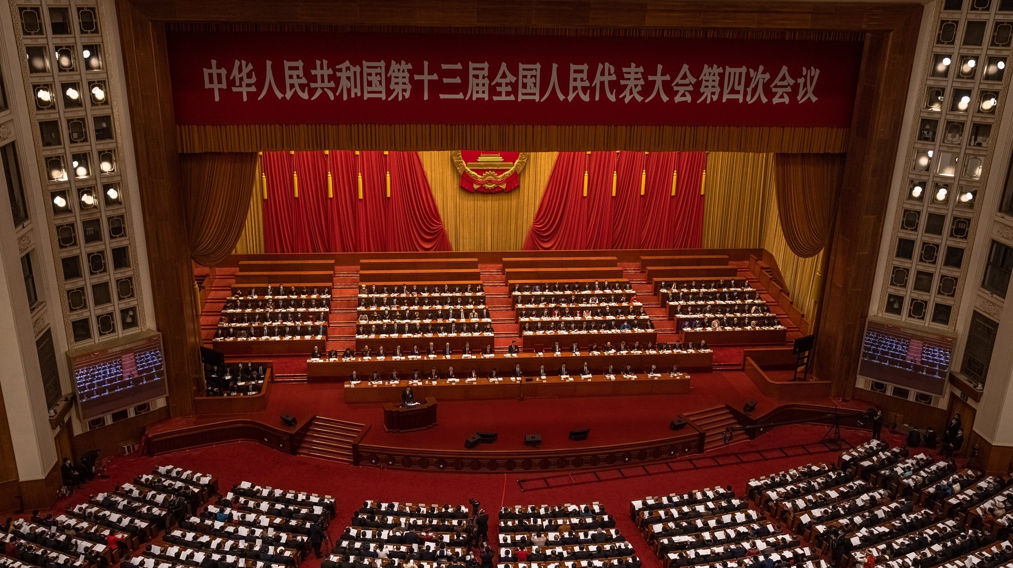 epaselect epa09052986 Premier Li Keqiang delivers a speech during the opening session of the National People’s Congress (NPC) at the Great Hall of the People, in Beijing, China, 05 March 2021. China holds two major annual political meetings, The National People’s Congress (NPC) and the Chinese People&#039;s Political Consultative Conference (CPPCC) which run alongside and together known as &#039;Lianghui&#039; or &#039;Two Sessions&#039;.  EPA/ROMAN PILIPEY