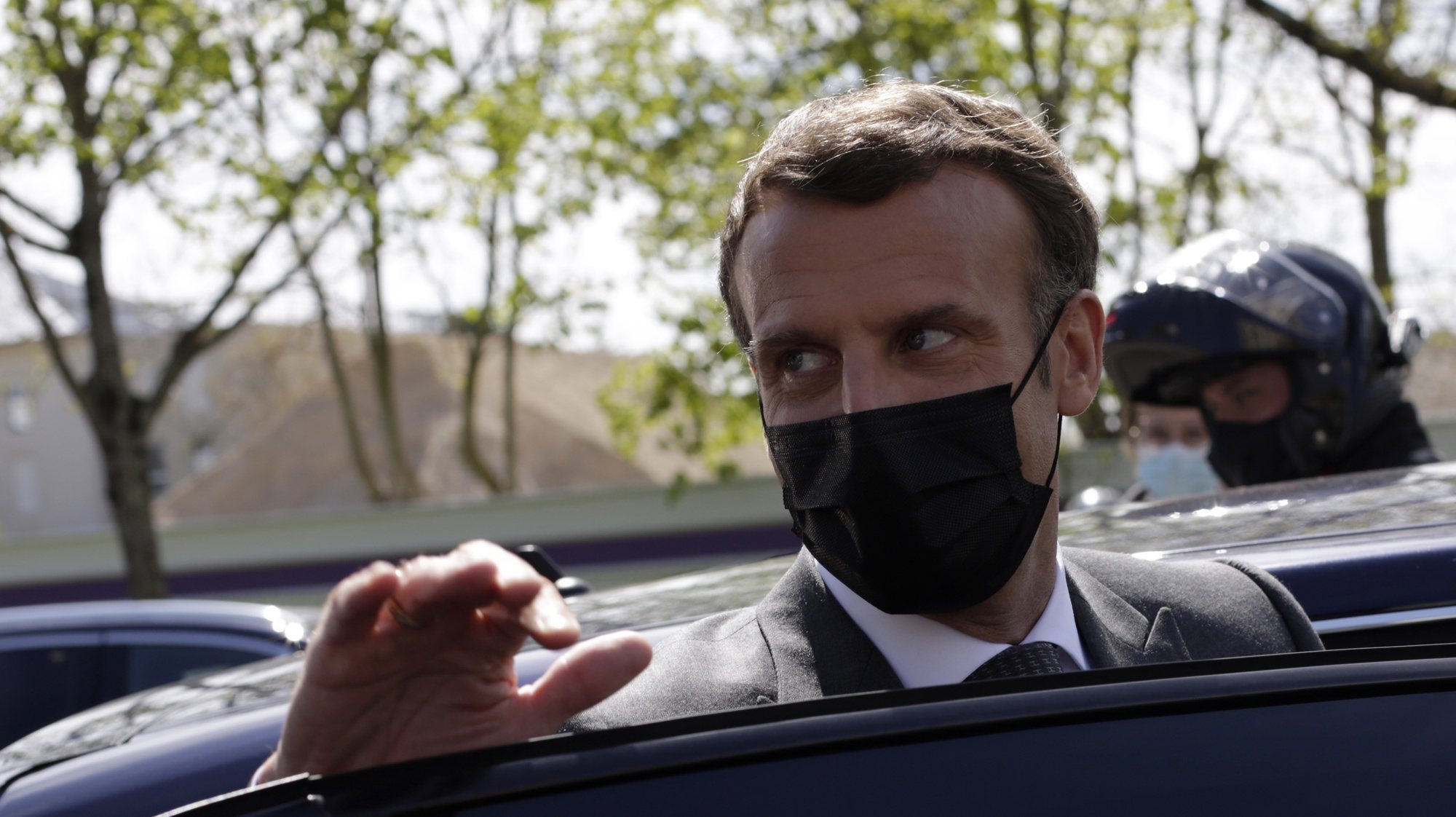 epa09162037 French President Emmanuel Macron enters his car after a visit in a school in Melun, south of Paris, France, 26 April 2021. Nursery and primary schools reopened on 26 April across France after a three-week closure in the first step out of the country&#039;s partial lockdown. Meanwhile, high schools students are following online classes.  EPA/Thibault Camus / POOL  MAXPPP OUT