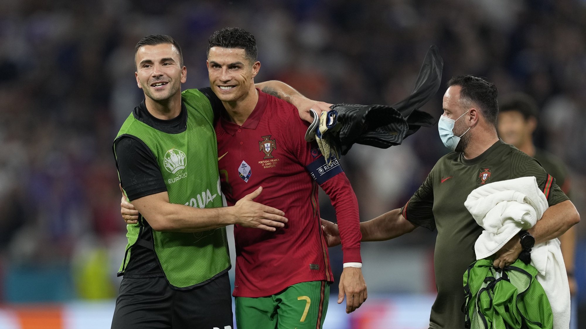 Portugal players Cristiano Ronaldo and Anthony Lopes celebrate after the UEFA EURO 2020 group F preliminary round soccer match between Portugal and France in Budapest, Hungary, 23 June 2021. HUGO DELGADO/LUSA