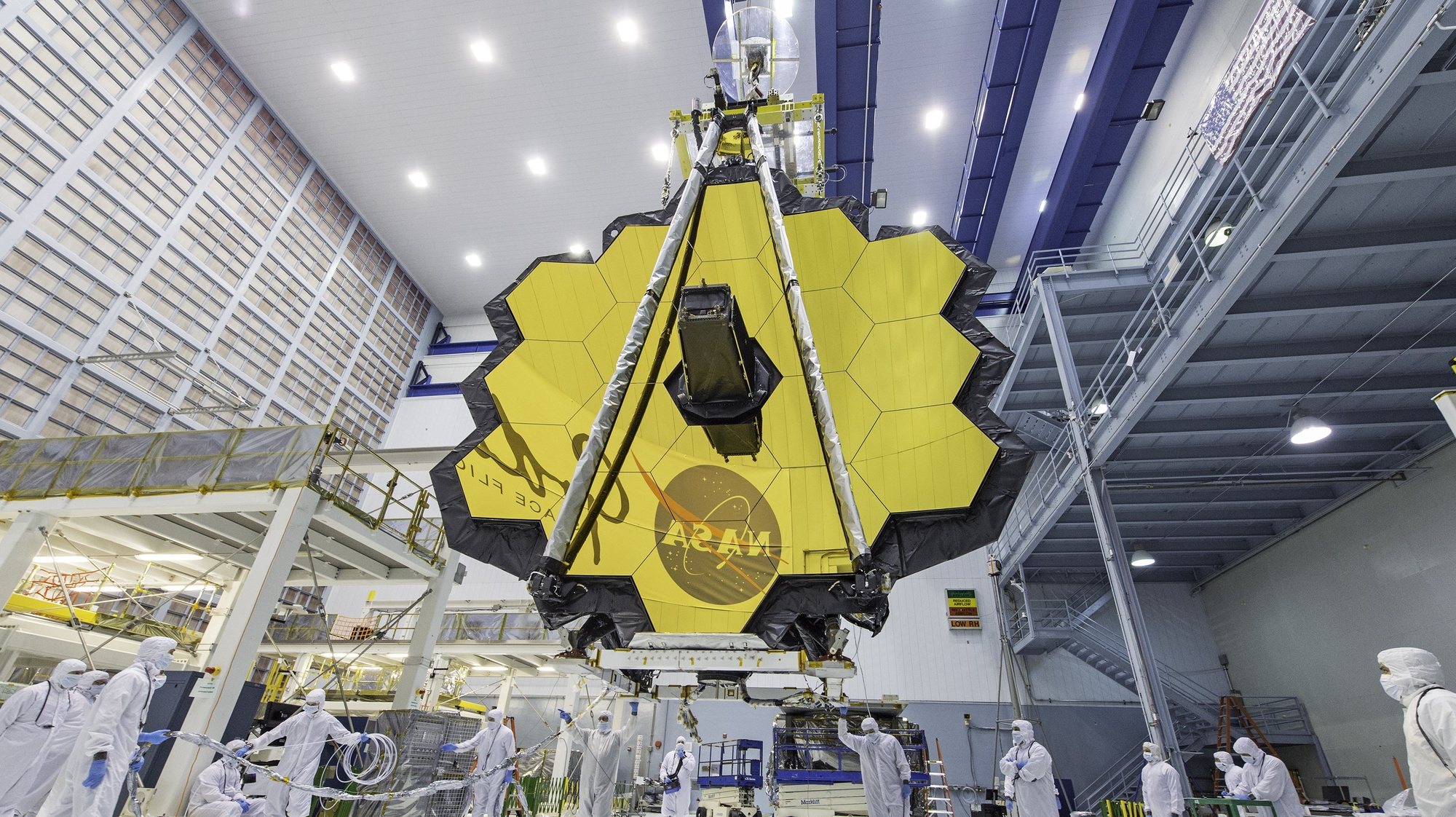epa09614360 (FILE) - An undated handout file picture made available by the National Aeronautics and Space Administration (NASA) shows NASA technicians lifting the James Webb Space Telescope using a crane and moving it inside a clean room at NASA&#039;s Goddard Space Flight Center in Greenbelt, Maryland, USA (issued 01 December 2021). According to NASA, engineering teams have completed additional testing confirming NASA&#039;s James Webb Space Telescope (JWST) is ready for flight, and launch preparations are resuming toward Webb&#039;s target launch date on 22 December 2021, at 7:20 a.m. EST. Webb&#039;s primary mirror will collect light for the observatory in the scientific quest to better understand our solar system and beyond. The JWST is an international project led by NASA with its European (ESA) and Canadian (CSA) partners.  EPA/NASA/Desiree Stover HANDOUT  HANDOUT EDITORIAL USE ONLY/NO SALES