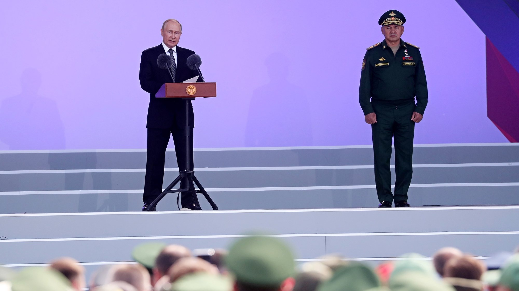 epa10122392 Russian President Vladimir Putin (L) and Defence Minister Sergei Shoigu (R) attend the opening ceremony of the the International Military-Technical Forum Army-2022 held at Patriot Park in Kubinka, outside Moscow, Russia, 15 August 2022. The 7th International Military-Technical Forum Army-2021 is held from 15 to 21 August 2022 at Patriot Expo, Kubinka Air Base and Alabino military training grounds.  EPA/MAXIM SHIPENKOV