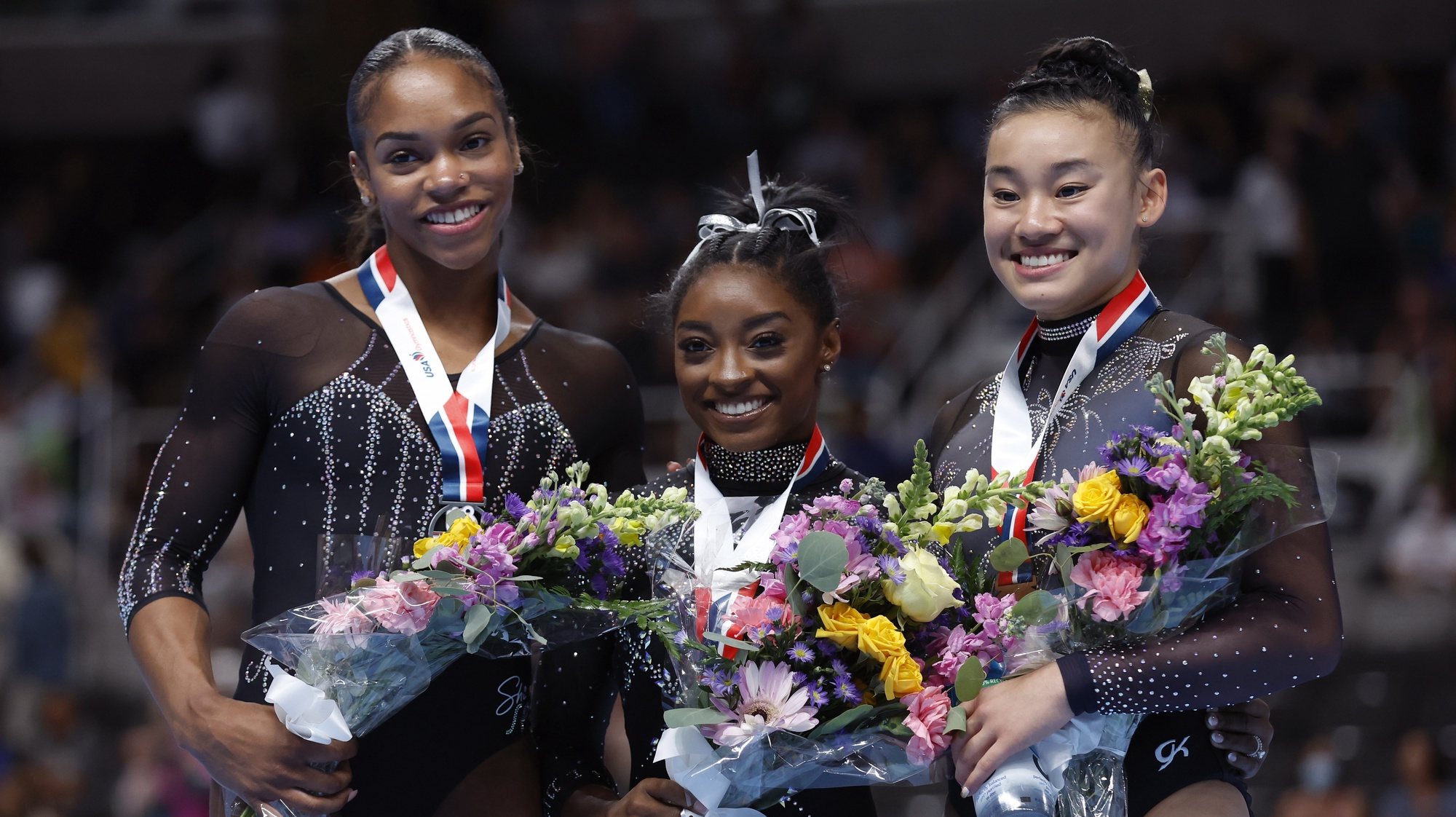 epa10824735 Simone Biles (C) wins first place, Shilese Jones (L) wins second place, and Leanne Wong (R) wins third place overall in the US Gymnastics Championships Women&#039;s Day 2 at SAP Center in San Jose, California, USA, 27 August 2023.  EPA/JOHN G. MABANGLO