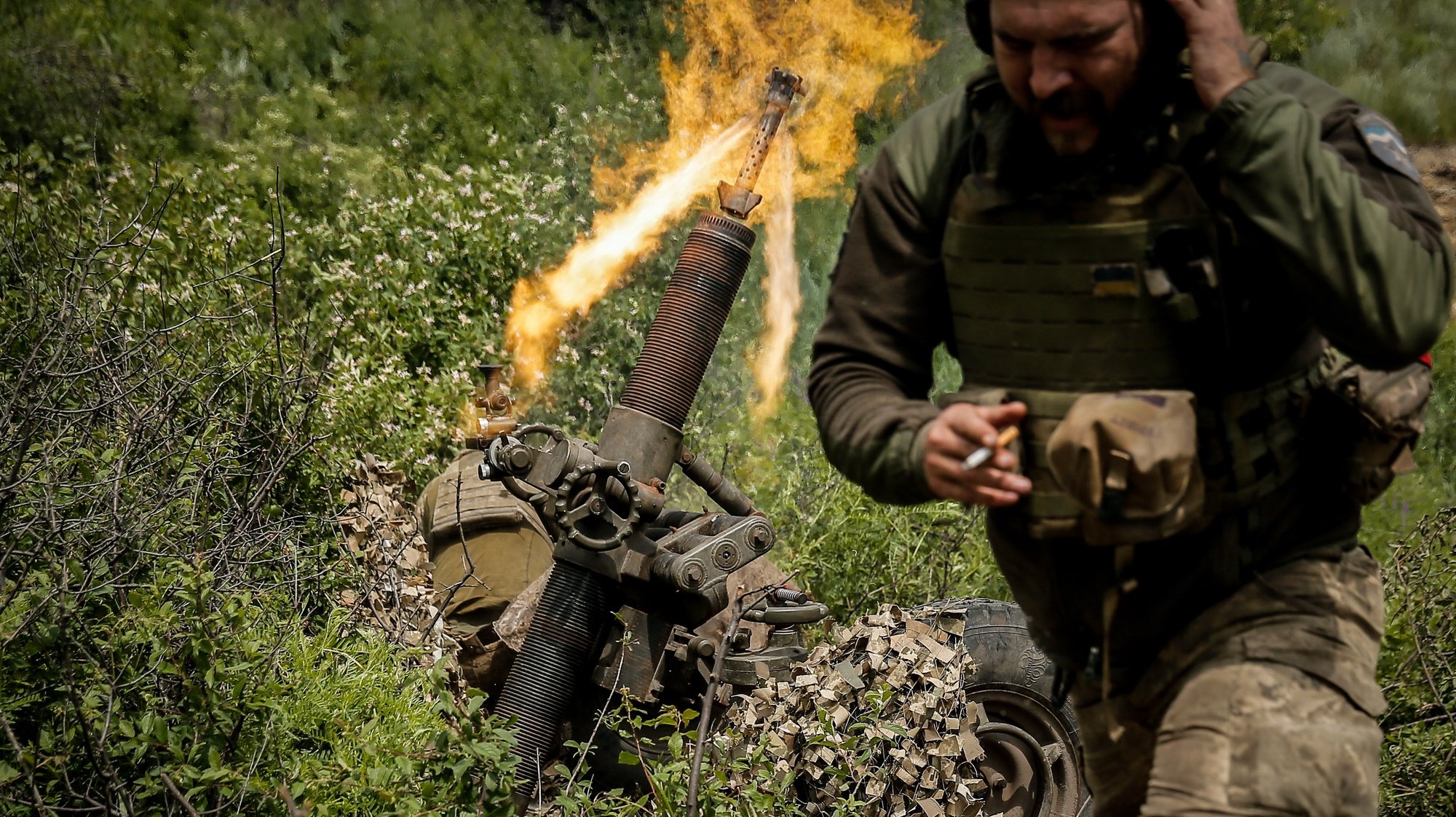 epa10648098 Members of the 10th Separate Mountain Assault Brigade &#039;Edelweiss&#039;, a unit of the Ukrainian Ground Forces, fire a mortar at an undisclosed location in the Bakhmut direction, Donetsk region, eastern Ukraine, 23 May 2023, amid the Russian invasion. The frontline city of Bakhmut, a key target for Russian forces, has seen heavy fighting for months. Russian troops on 24 February 2022, entered Ukrainian territory, starting a conflict that has provoked destruction and a humanitarian crisis.  EPA/OLEG PETRASYUK