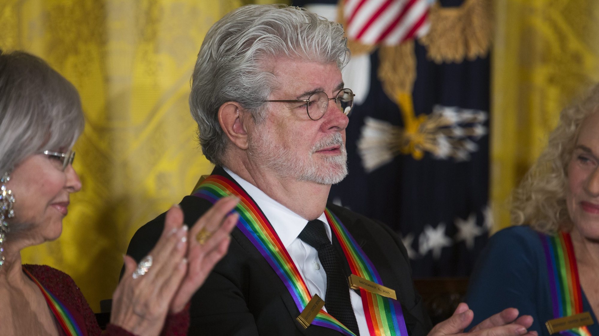 epa05057651 Filmmaker George Lucas attends the Kennedy Center Honorees Reception in the East Room of the White House in Washington, DC, USA, 06 December 2015. US President Barack Obama and First Lady Michelle Obama hosted the gathering  EPA/JIM LO SCALZO