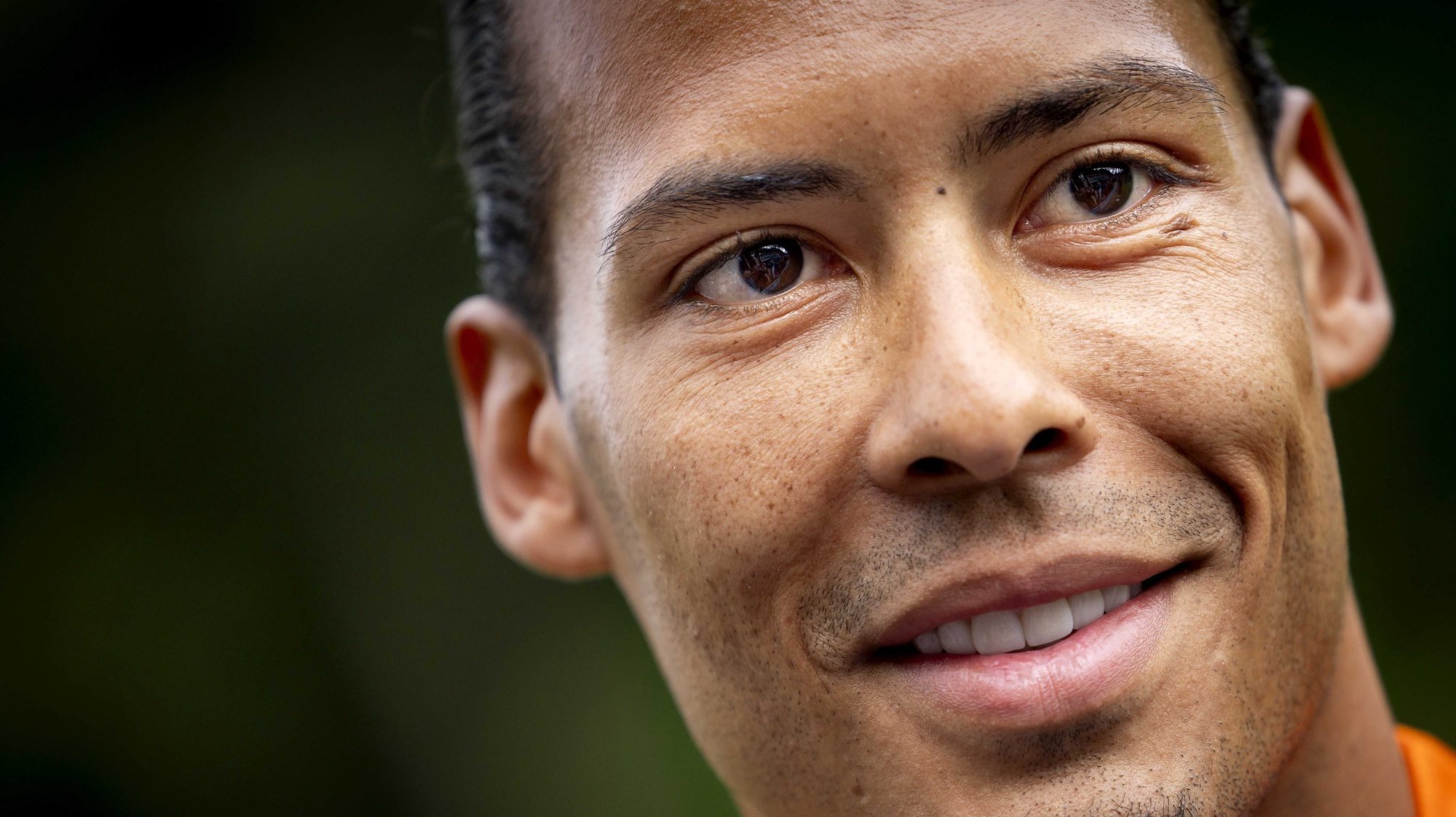epa11374204 Virgil van Dijk of the Netherlands speaks of to the media during a training session, in Zeist, the the Netherlands, 27 May 2024. The Dutch national team is preparing for the UEFA EURO 2024 which will be held from 14 June to 14 July 2024 in Germany.  EPA/KOEN VAN WEEL