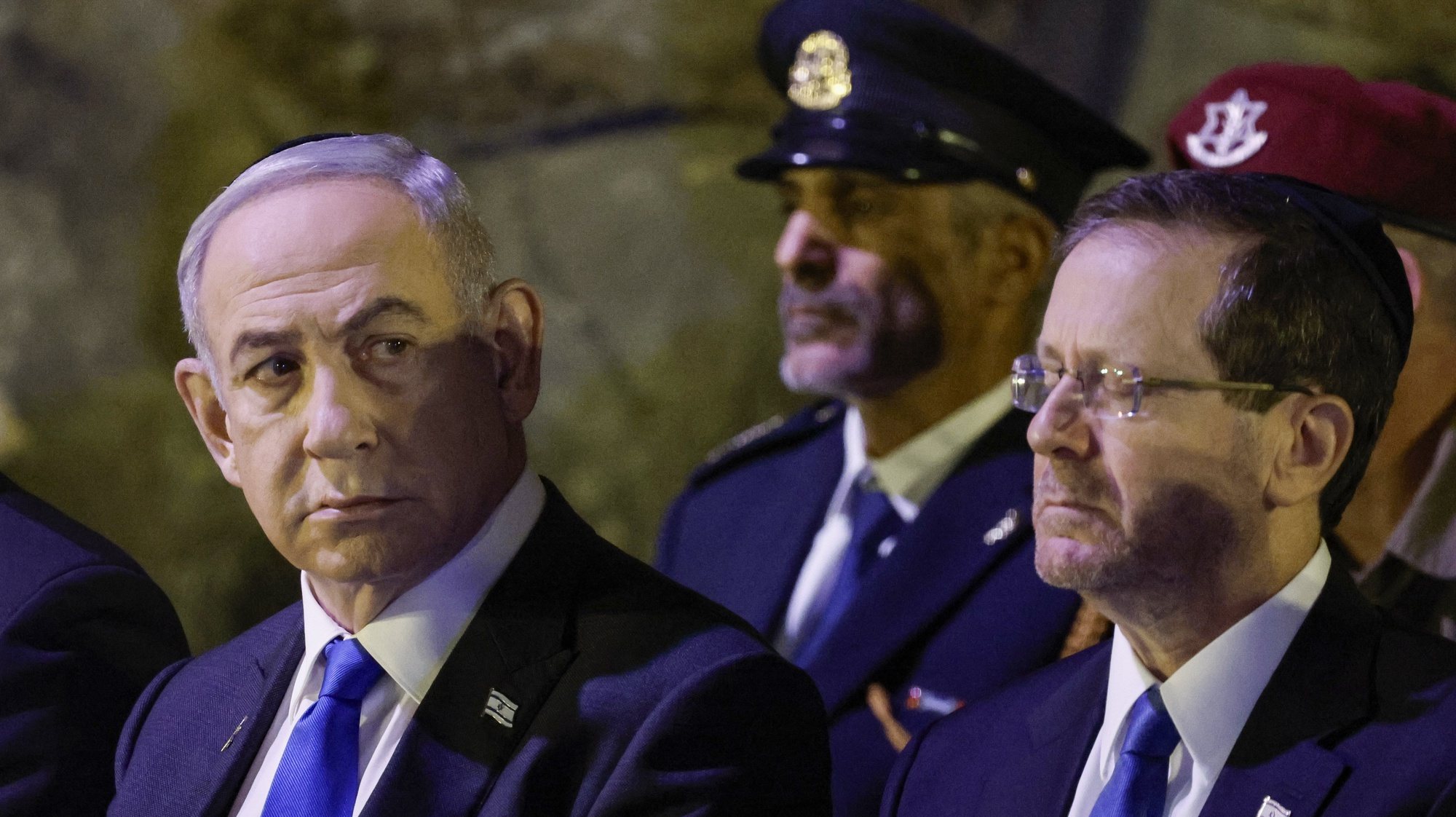 epa11320988 Israeli Prime Minister Benjamin Netanyahu (L) and President Isaac Herzog (R) attend a wreath-laying ceremony marking Israel&#039;s national Holocaust Remembrance Day in the Hall of Remembrance at Yad Vashem, the World Holocaust Remembrance Centre, in Jerusalem, 06 May 2024. Israel marks the memorial day to commemorate the approximately six million Jews killed in the Holocaust by Nazi Germany during World War II (WWII).  EPA/AMIR COHEN / POOL