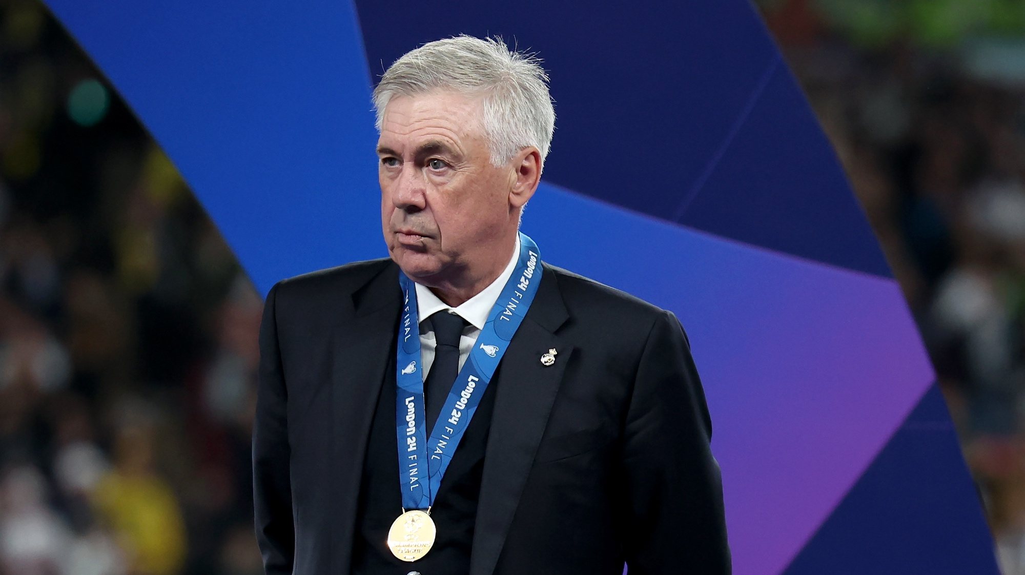 epa11384943 Real Madrid head coach Carlo Ancelotti waits for the start of the trophy ceremony after picking up his winner&#039;s medal following the UEFA Champions League final match of Borussia Dortmund against Real Madrid, in London, Britain, 01 June 2024. Real Madrid won 2-0.  EPA/NEIL HALL