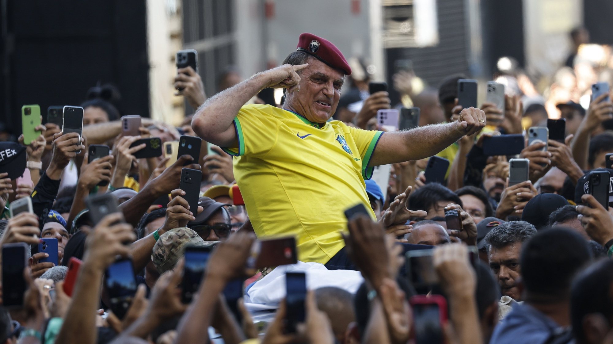 epa11292738 Former Brazilian president Jair Bolsonaro attends a march in his support in Rio de Janeiro, Brazil, 21 April 2024. Former Brazilian president Bolsonaro (2019-2022) called for a march to &#039;defend democracy and freedom of speech.&#039;  EPA/Antonio Lacerda