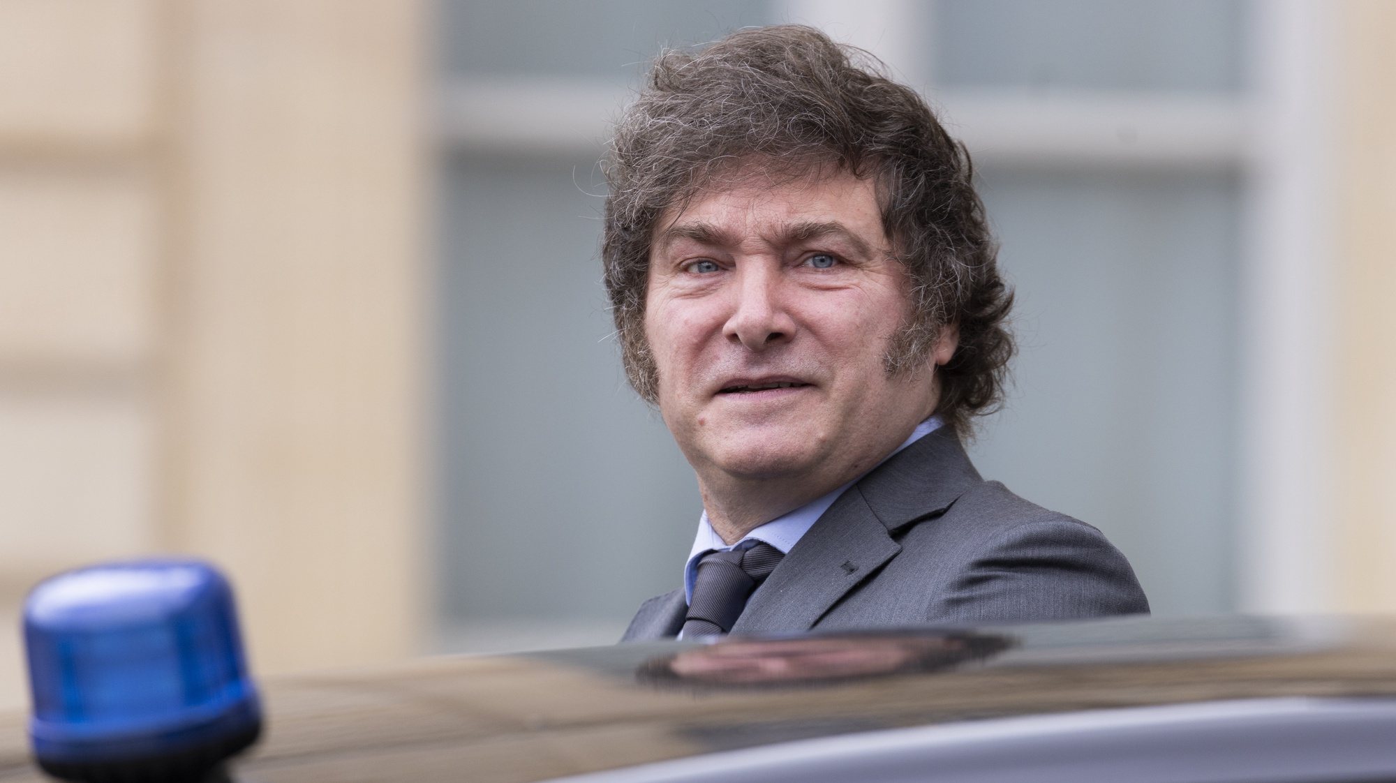 epa11496964 President of Argentina Javier Milei leaves the Elysee Palace after a bilateral meeting with French president Emmanuel Macron (unseen) ahead of the opening of the Paris 2024 Olympic Games, in Paris, France, 26 July 2024. More than hundred heads of State and Government will take part in the Opening Ceremony to be held on 26 July evening along the Seine river in Paris. It is the first time that an Olympic Opening Ceremony does not take place in a stadium. The Paris Olympic Games will run until 11 August 2024.  EPA/ANDRE PAIN