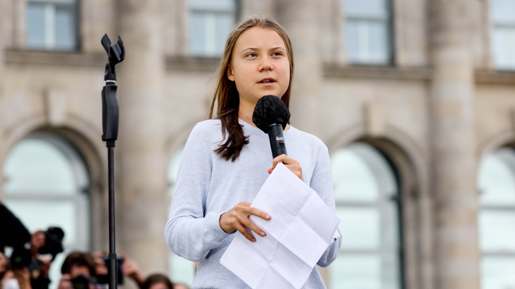 epa09485508 Swedish climate activist Greta Thunberg delivers a speech at the Fridays For Future global climate action day in Berlin, Germany, 24 September 2021. Climate activists of Fridays For Future call for socially fair and consistent measures to limit climate heating to 1.5 degrees Celsius ahead of German federal elections, that take place on 26 September 2021. The young activists are planning hundreds of protests and demonstrations worldwide during a &#039;climate strike&#039; on 24 September 2021.  EPA/FILIP SINGER