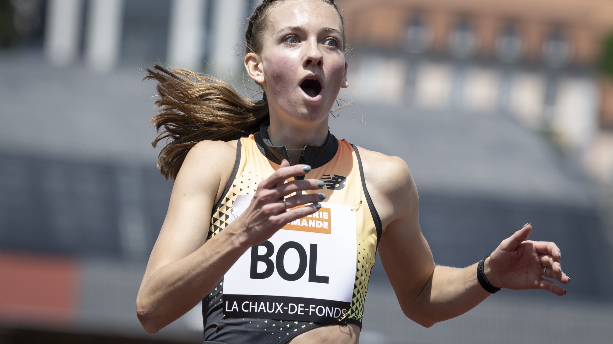 epa11477236 Femke Bol of Netherlands reacts after setting a new European record in the 400 metres hurdles Women during the 44th edition of Resisprint International, at the Stade de la Charriere, in La Chaux-de-Fonds, Switzerland, 14 July 2024.  EPA/ANTHONY ANEX