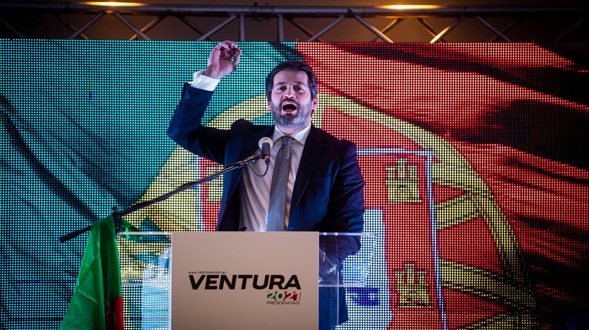 epa08963365 Portuguese presidential candidate for CHEGA party, Andre Ventura (C), addresses supporters after learning the results of the presidential election, at a Hotel in Lisbon, Portugal, 24 January 2021.  EPA/JOSE SENA GOULAO