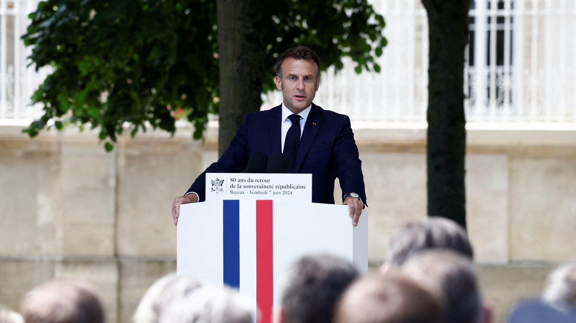 epa11395000 French President Emmanuel Macron delivers a speech during a ceremony to commemorate the return of republican sovereignty, on Place Charles de Gaulle in Bayeux, northwestern France, 07 June 2024. Macron visits Bayeux to celebrate the return of sovereign and republican France, and the new French institutions which were put in place as the territories were liberated. The ceremony is part of the 80th anniversary of the 1944 D-Day landings in Normandy region.  EPA/BENOIT TESSIER / POOL  MAXPPP OUT