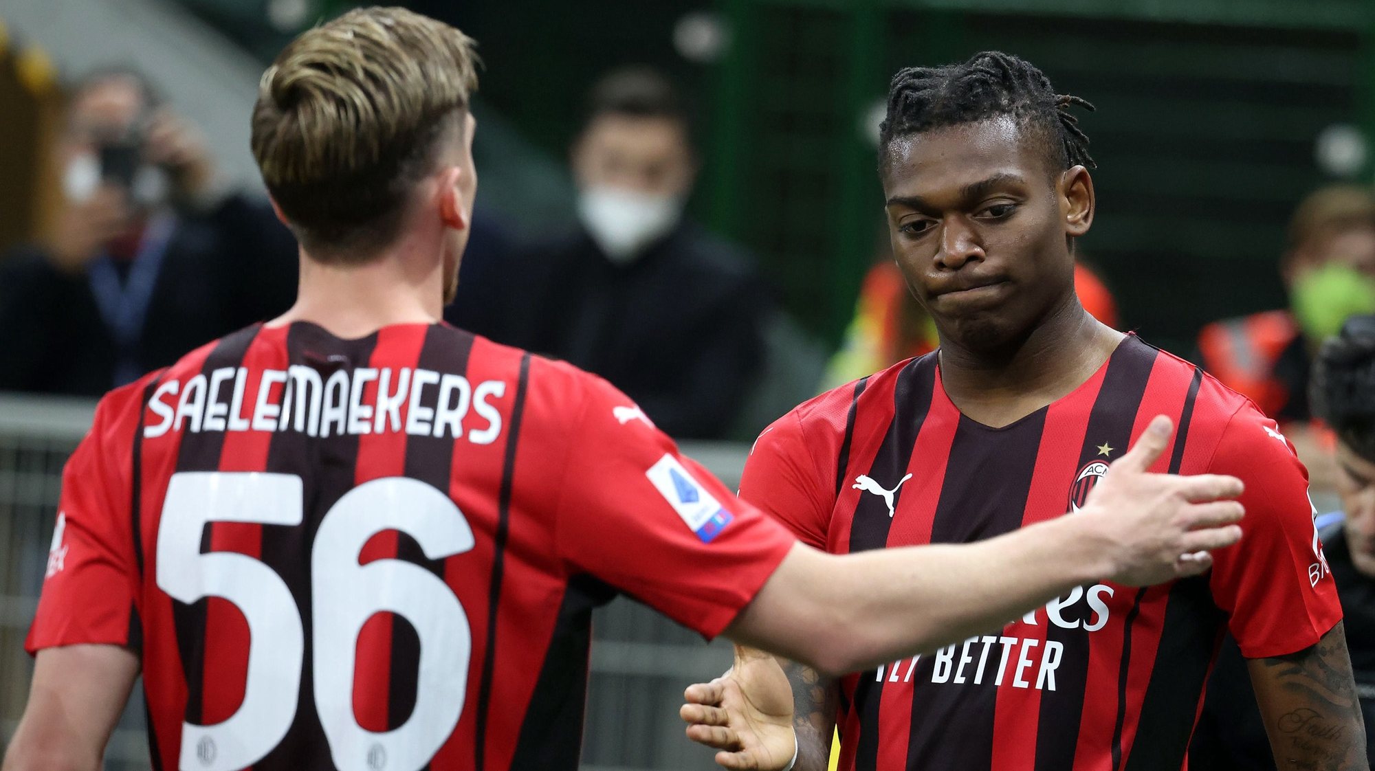 epa09892086 AC Milanâ€™s Rafael Leao (R) jubilates with his teammate  Alexis Saelemaekers after scoring goal of 1 to 0 during the Italian serie A soccer match between AC Milan and Genoa at Giuseppe Meazza stadium in Milan, 15 April 2022.  EPA/MATTEO BAZZI