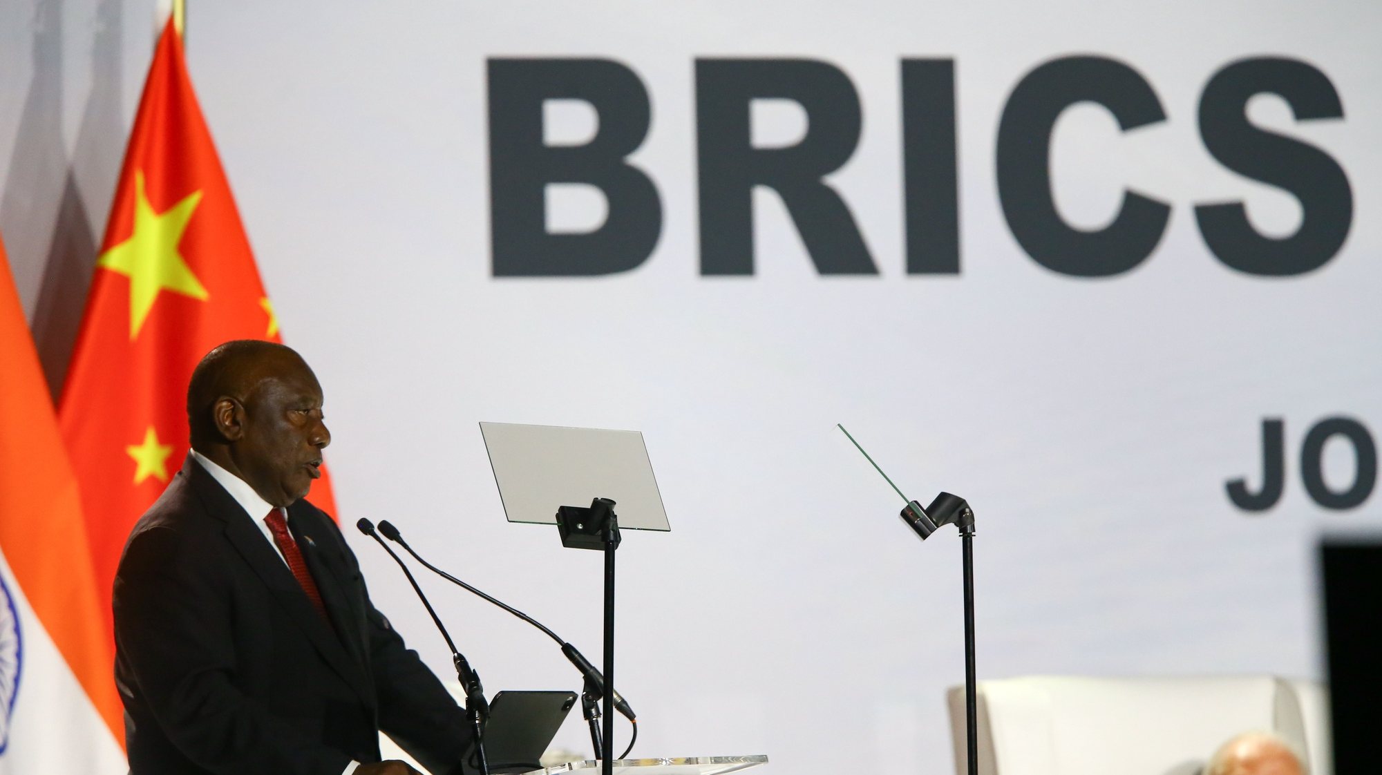 epa10813792 South African President Cyril Ramaphosa speaks during the 15th BRICS Summit, in Johannesburg, South Africa, 22 August 2023. South Africa is hosting the 15th BRICS Summit, (Brazil, Russia, India, China and South Africa), as the groupâ€™s economies account for a quarter of global gross domestic product. Dozens of leaders of other countries in Africa, Asia and the Middle East are also attending the summit.  EPA/KIM LUDBROOK