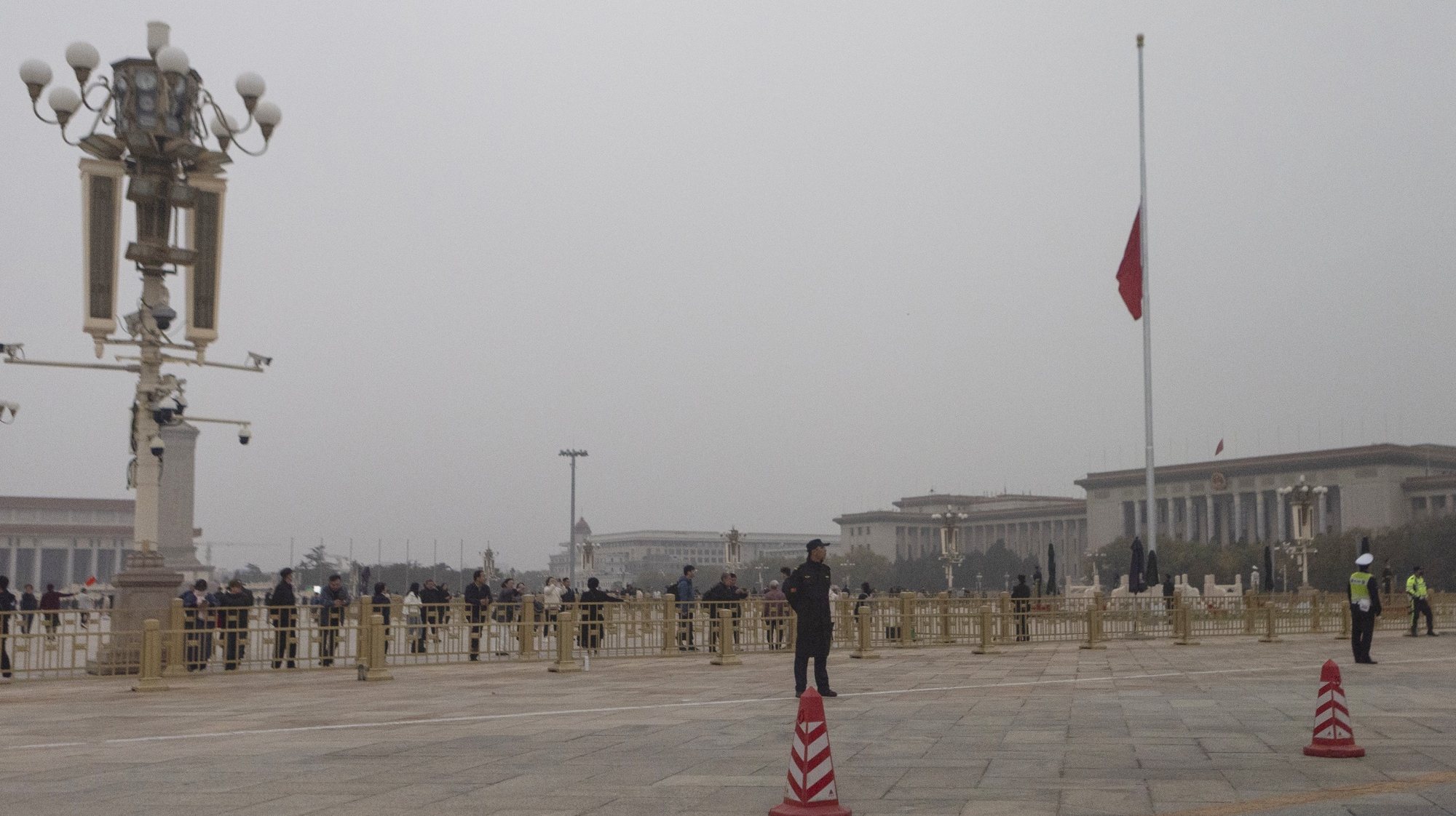 epa10953623 China&#039;s National Flag flies at half-mast at Tiananmen square, after the passing of former Premier Li Keqiang, in Beijing, China, 02 November 2023. Li Keqiang&#039;s remains will be cremated on 02 November in Beijing.  EPA/ANDRES MARTINEZ CASARES