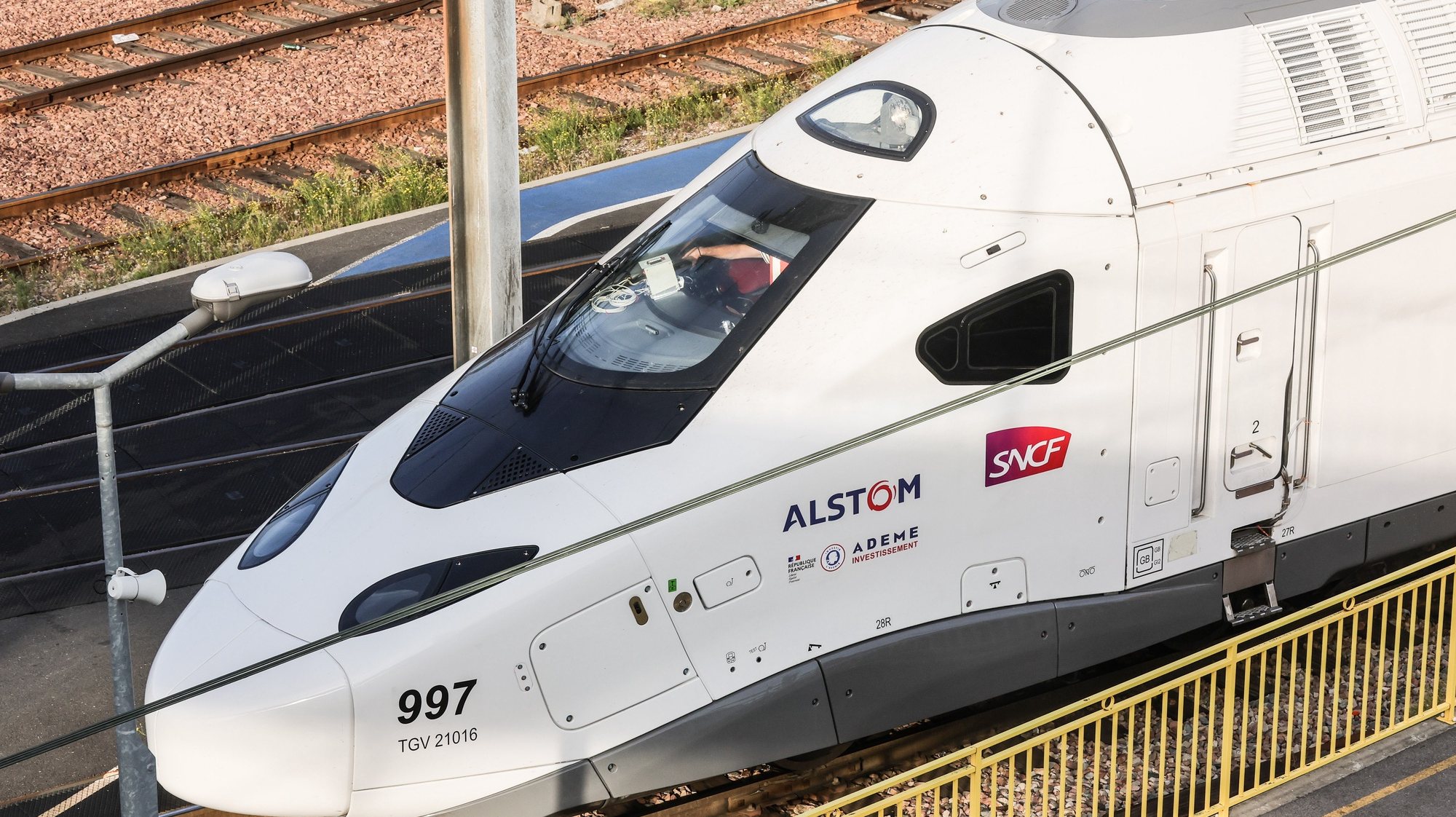 epa10903635 The new TGV INOUI 2025 high-speed passenger train arrives at the SNCF Technicentre Sud Est Europeen (TSEE) rail network in Paris, France, 06 October 2023. The new TGV M is a high-speed passenger train that offers 100 extra seats and lower CO2 emissions than previous models. The new train, which will be deployed on France&#039;s railways from 2025, is the result of a collaboration between SNCF Voyageurs (the French national railway company) and Alstom.  EPA/TERESA SUAREZ