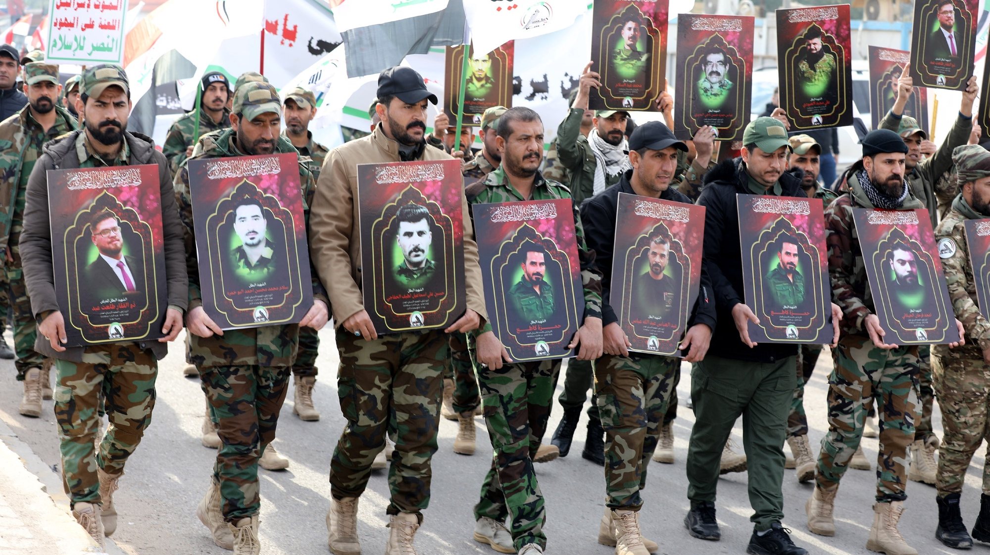 epaselect epa11125326 Members of the Iraqi Shiite Popular Mobilization Forces (PMF) carry images of their comrades, who were killed in recent US air strikes in western Iraq, during a funeral procession in Baghdad, Iraq, 04 February 2024. The United States Central Command (CENTCOM) said on 02 February it carried out airstrikes in Iraq and Syria on more than 85 targets against Iran&#039;s Islamic Revolutionary Guards Corps (IRGC) Quds Force and affiliated militia groups. The US attacks were in retaliation for a drone strike that killed three US service members in Jordan the week before. The Popular Mobilization Forces (PMF) announced that 16 of its members were killed and 36 others wounded in US air strikes that targeted eight locations in Al-Anbar Governorate, western Iraq, near the Iraqi-Syrian border. The Iraqi government has condemned the retaliatory US strikes against pro-Iran militants on its territory as a violation of Iraqi sovereignty.  EPA/AHMED JALIL