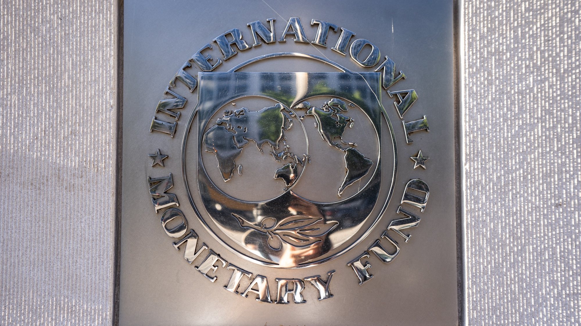 epa08743972 A sign for the International Monetary Fund (IMF) outside its headquarters in Washington, DC, USA, 14 October 2020. The IMF World Bank Group 2020 annual fall meeting has gone virtual due to the Coronavirus pandemic.  EPA/JIM LO SCALZO