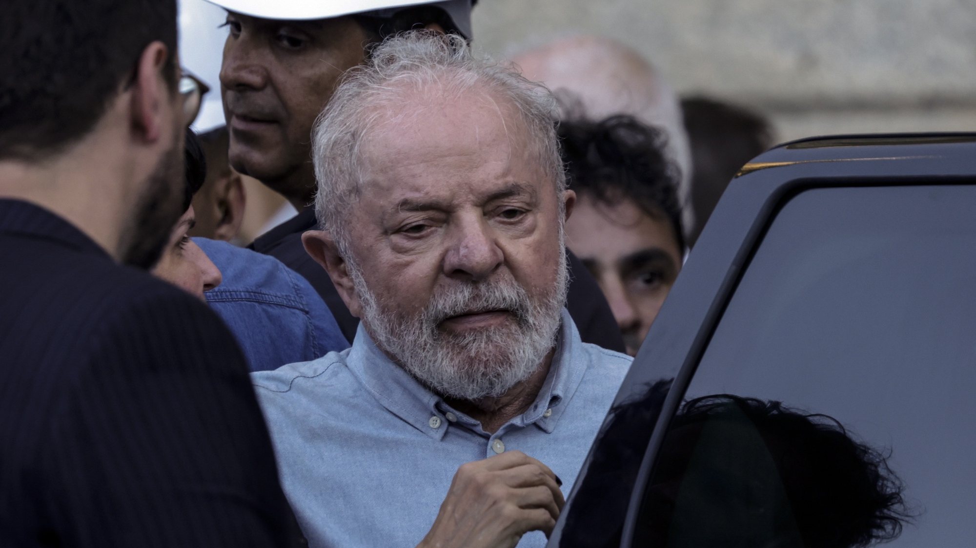 epa10540663 Brazilian President Luiz Inacio Lula da Silva is seen during a tour of the reconstruction works of the National Museum, in Rio de Janeiro, Brazil, 23 March 2023 (issued 24 March 2023). Lula postponed on 24 March his trip to China for one day, given a medical recommendation for &quot;mild&quot; pneumonia, official sources reported.  EPA/Antonio Lacerda